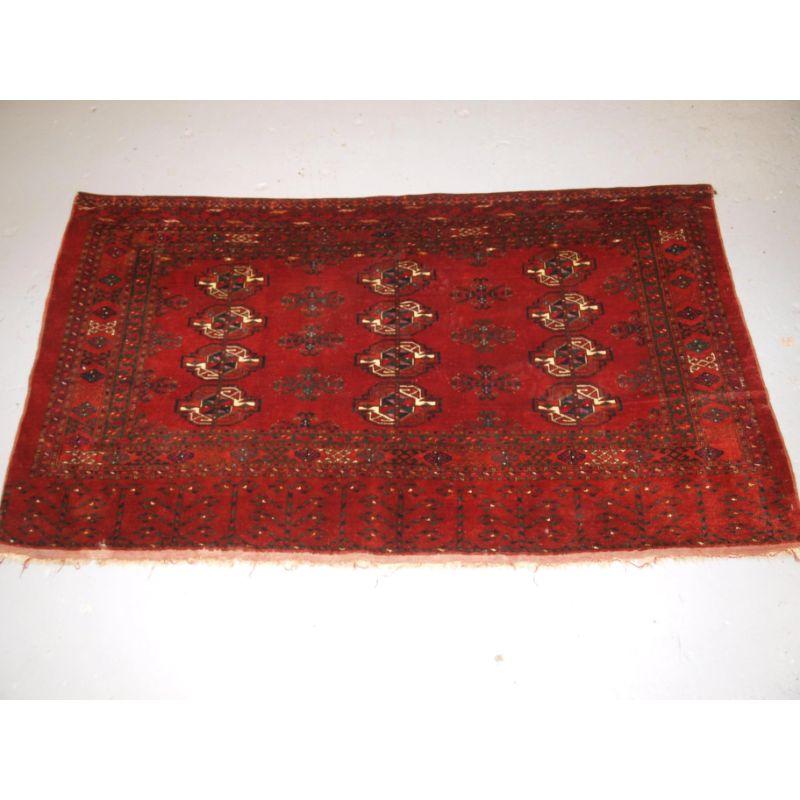 Antique Ersari Turkmen 12 gul chuval of very large size, with clear red colour. The elem design is a stylised tree design.

Slight even wear with good pile.

Hand washed and ready for use or display

Additional information:
Origin: Turkish
Age: