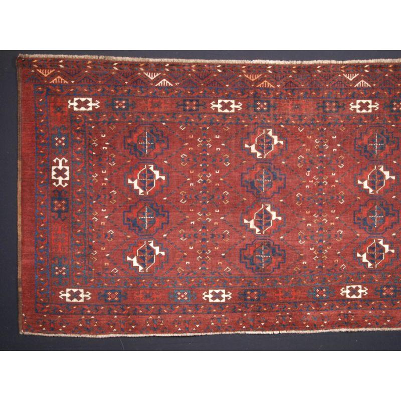 Antique Ersari Turkmen 12 gul chuval with good colour.

The chuval is well drawn with twelve large guls in alternating colours, the border design and the minor guls are all classic Turkmen designs.

The chuval has even wear with medium