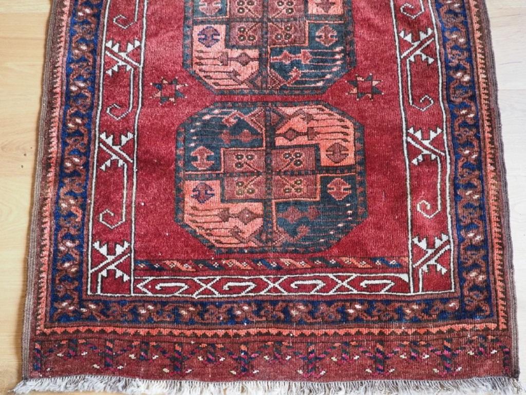 Antique Ersari Turkmen rug of excellent design and colour, the rug is of a very scarce small square size; the rug is of a rich red colour
Circa 1920

The rug has two large Ersari guls to the field and a classic narrow North Afghan border which