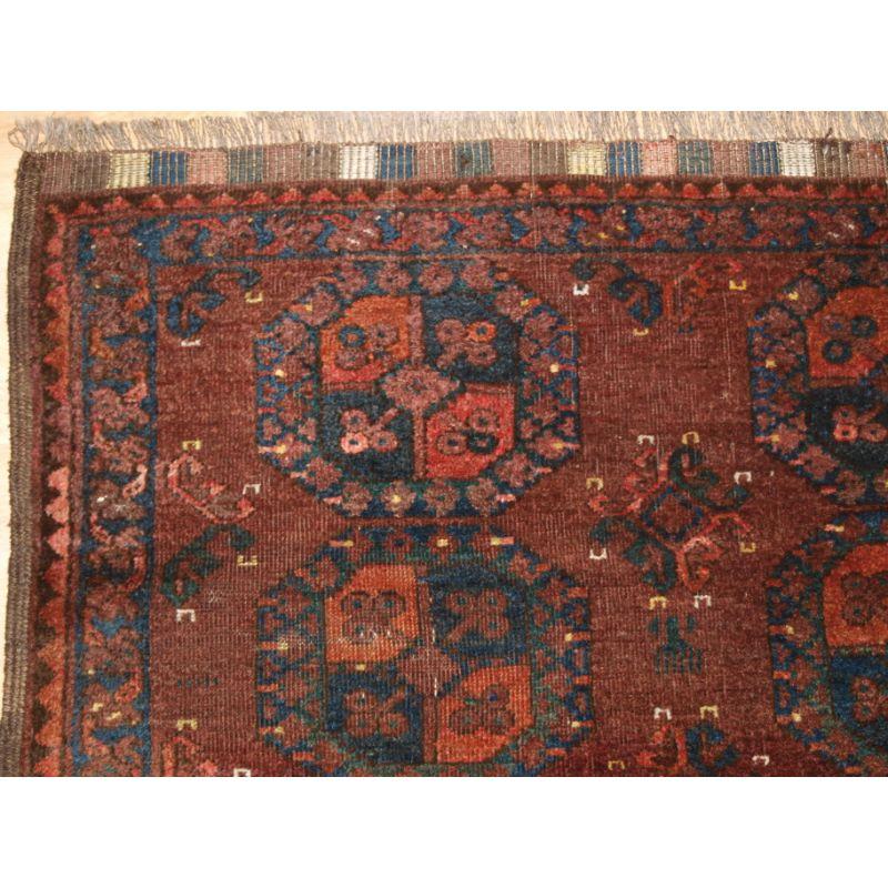 Antique Ersari Turkmen rug of excellent design with earth colours, the rug is of a very scarce small square size.

The rug has two rows of five traditional Ersari guls to the field and a classic narrow North Afghan border.

The rug is in fair