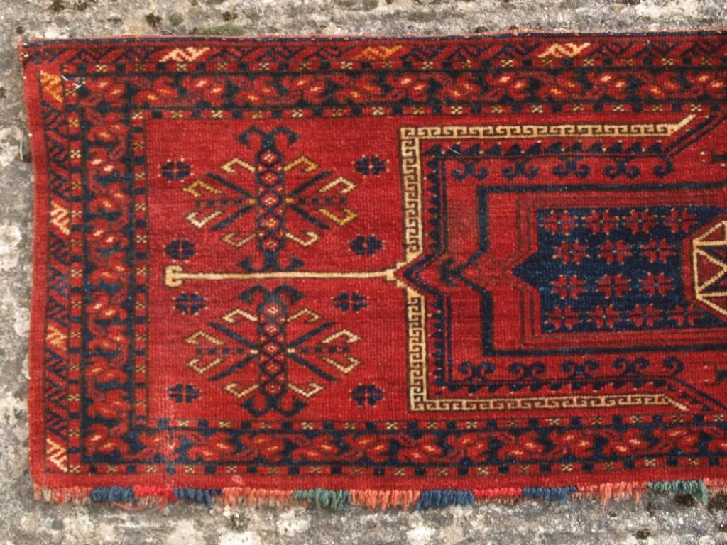 Antique Ersari Turkmen torba with star in octagon design
Circa 1880

A very good torba with a well drawn example of this classic Ersari design The colour is superb with a clear soft red, indigo blues and yellow high lights There are the remnants of
