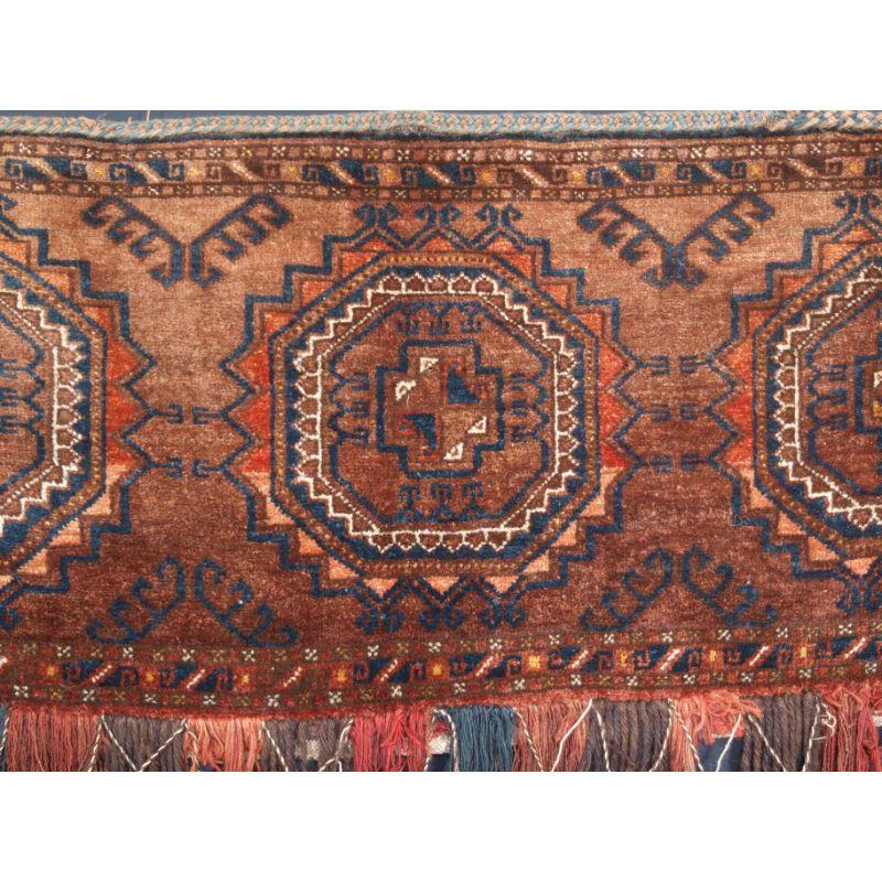 Antique Ersari Turkmen torba of very large size, with turreted gul design. Probably by the Ersari of Northern Afghanistan.

This large size Ersari torba was probably woven as a dowry item and used to decorate the side of a camel during the wedding