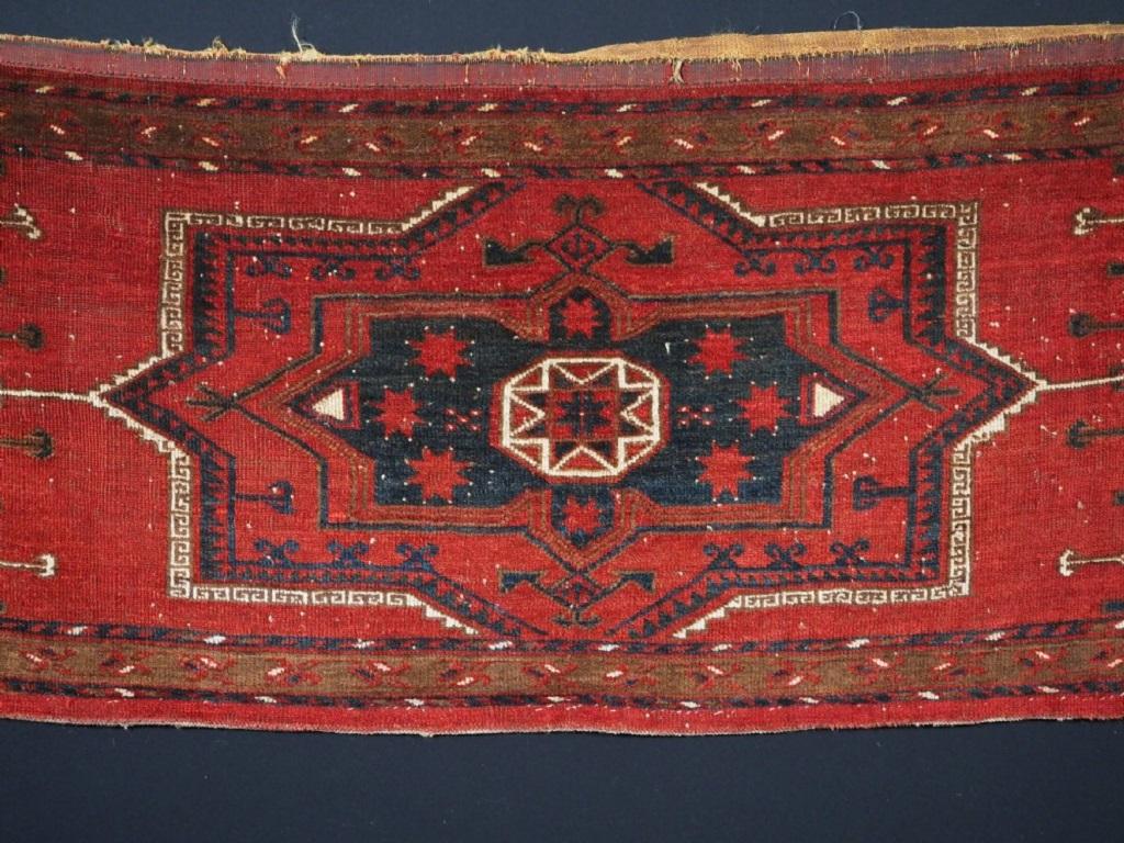 Antique Ersari Turkmen torba with star in octagon design of large size
Circa 1870

A very good torba with a well drawn example of this classic Ersari design The colour is superb with a clear red The central star in octagon is surrounded by six