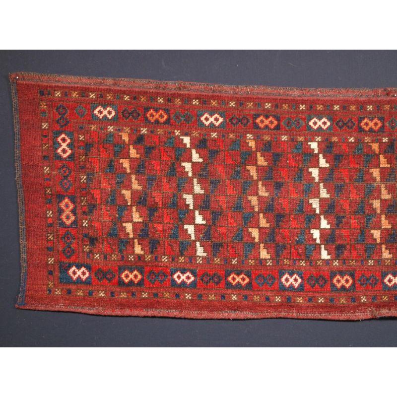 Antique Ersari Turkmen torba of unusual design, possibly by the Turkmen of Beshir.

A good Ersari Turkmen torba with an unusual design on a rich red ground, note the clear yellow and ivory used throughout. These weavings are often considered to be