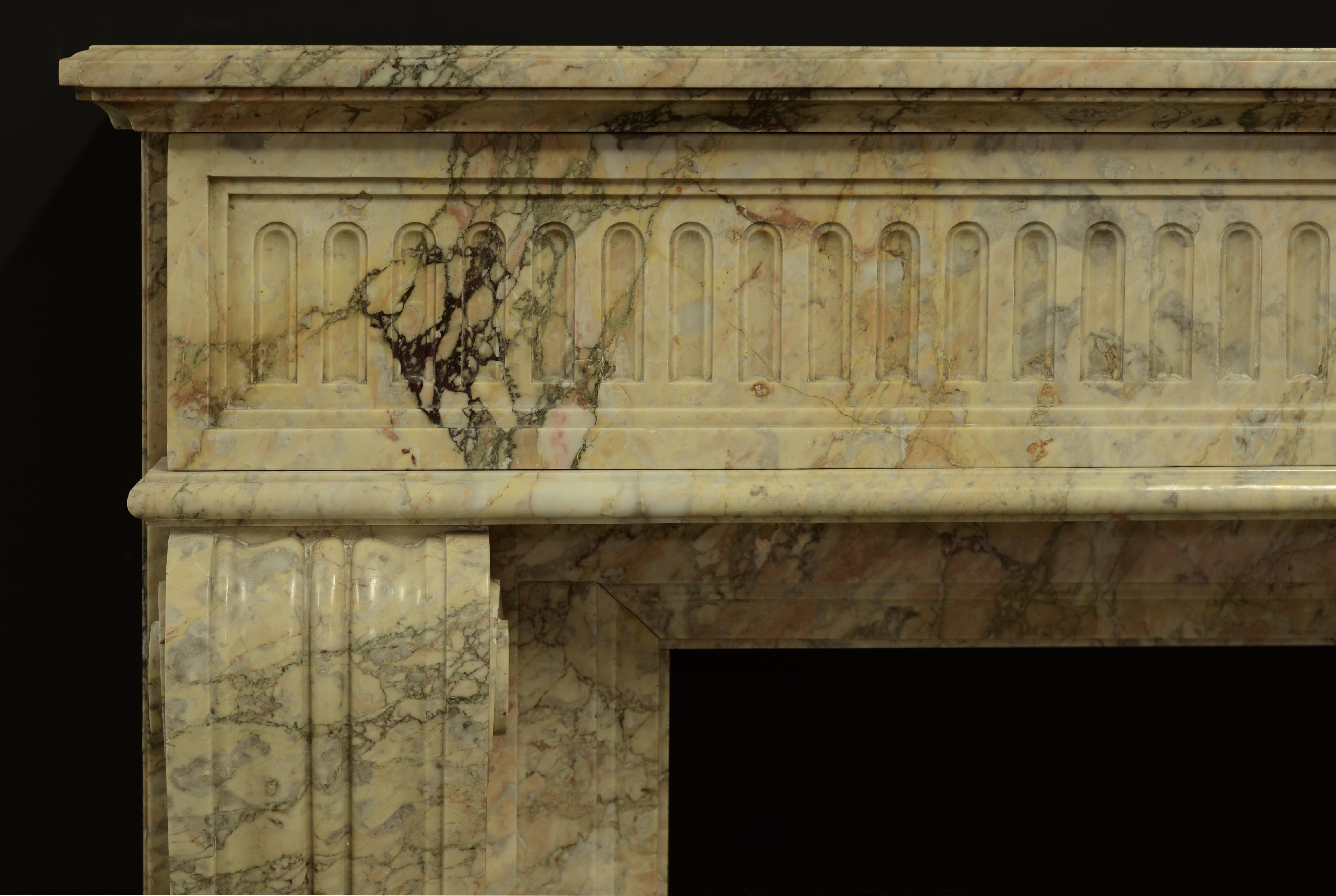 Exquisite antique Louis XVI from France, executed in beautiful escalette marble.

Some old restoration, great patina.
Ready to be shipped and installed.
   
The opening dimensions of this mantel are:
Height: 35.43 inch or 90 cm.
Width:  40.35 inch