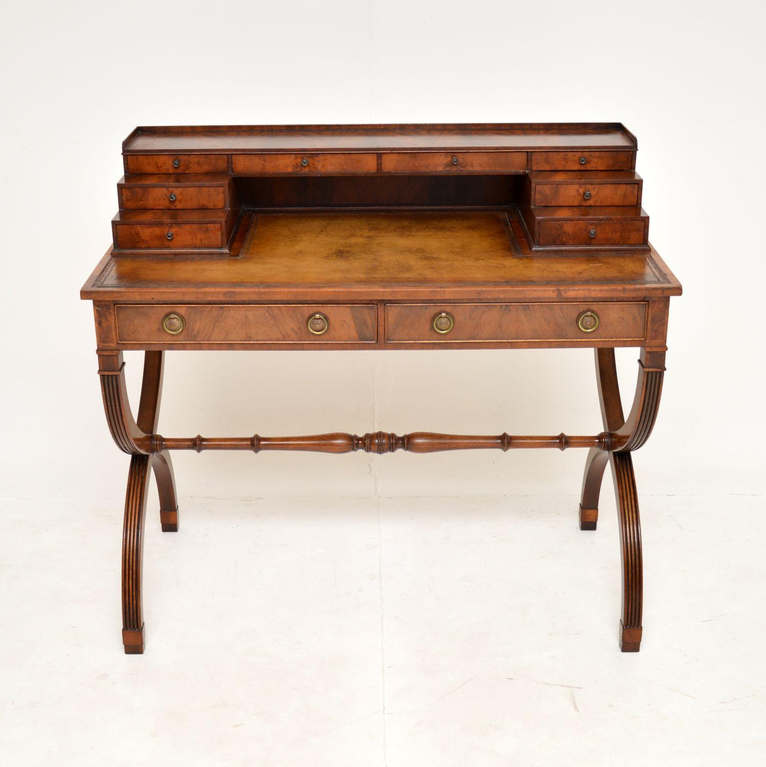 A beautiful antique writing desk in the Regency style. This was made in England, it dates from around the 1910-20’s.

It is of superb quality and is a very useful item. There is a generous work space with an inset tooled leather writing surface,