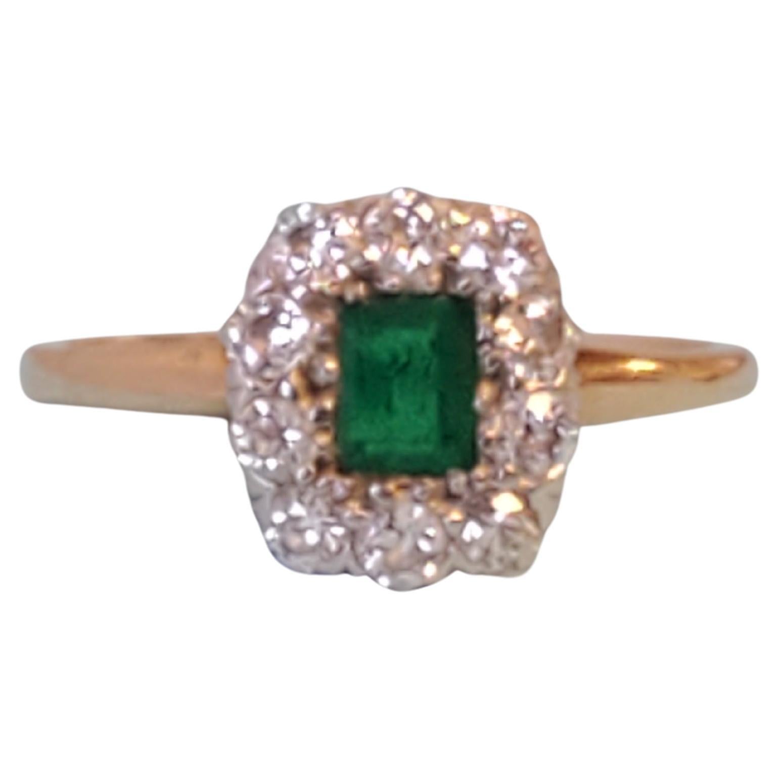 Antique 14k yellow gold emerald and old euro diamond ring.  Ultra green emerald center approximately .33ct surrounded by white vs old euro diamonds .40tcw. Ring size approx 4.5.