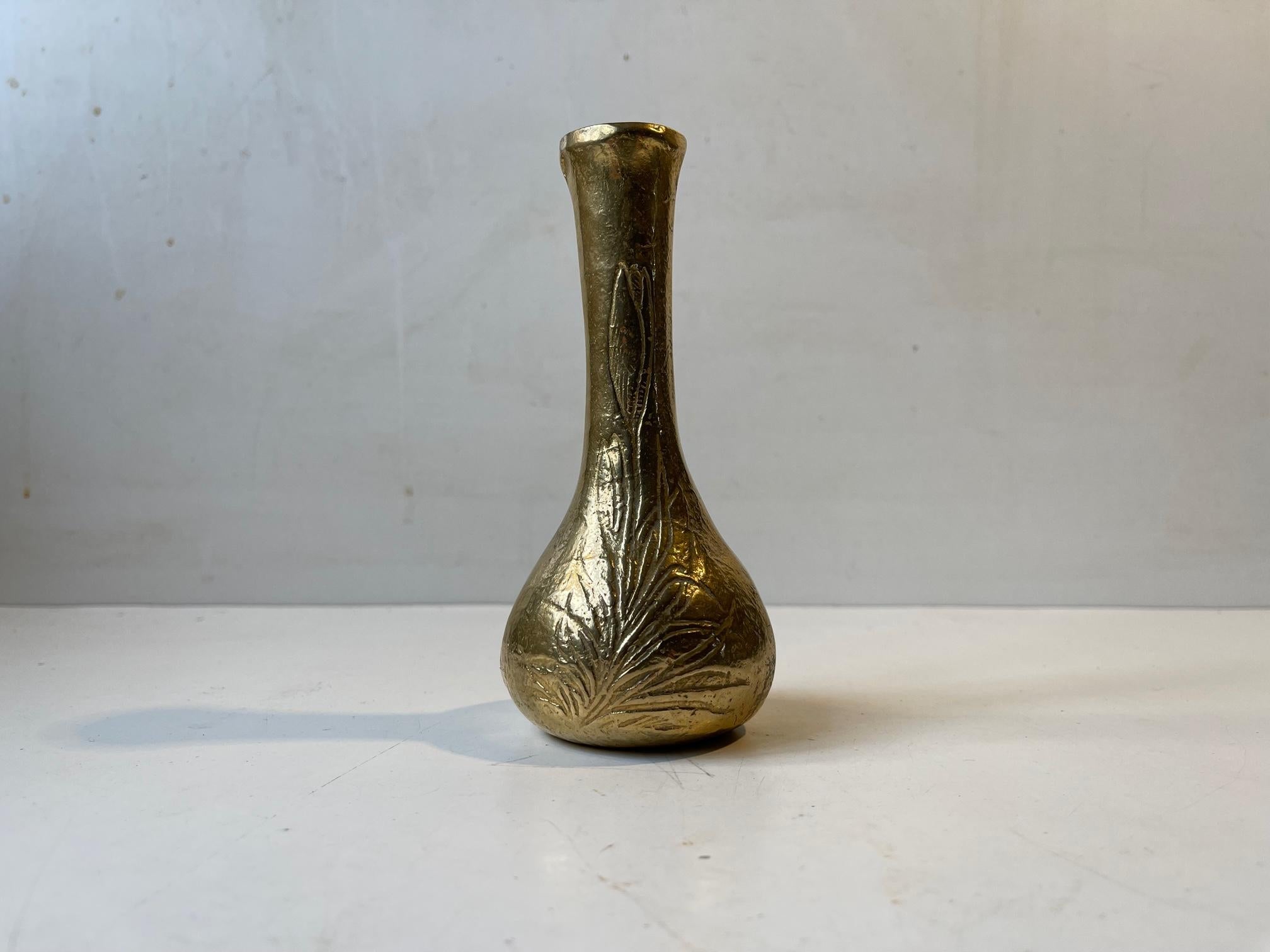Unusual heavy gilt bronze bud vase with hand etched floral motif. Probably made in Japan circa 1920-30. Please notice that it tilts slightly to one side. It has an authentic almost primitive vibe to it. No markings. Measurements: H: 15 cm, D: 7/3 cm.