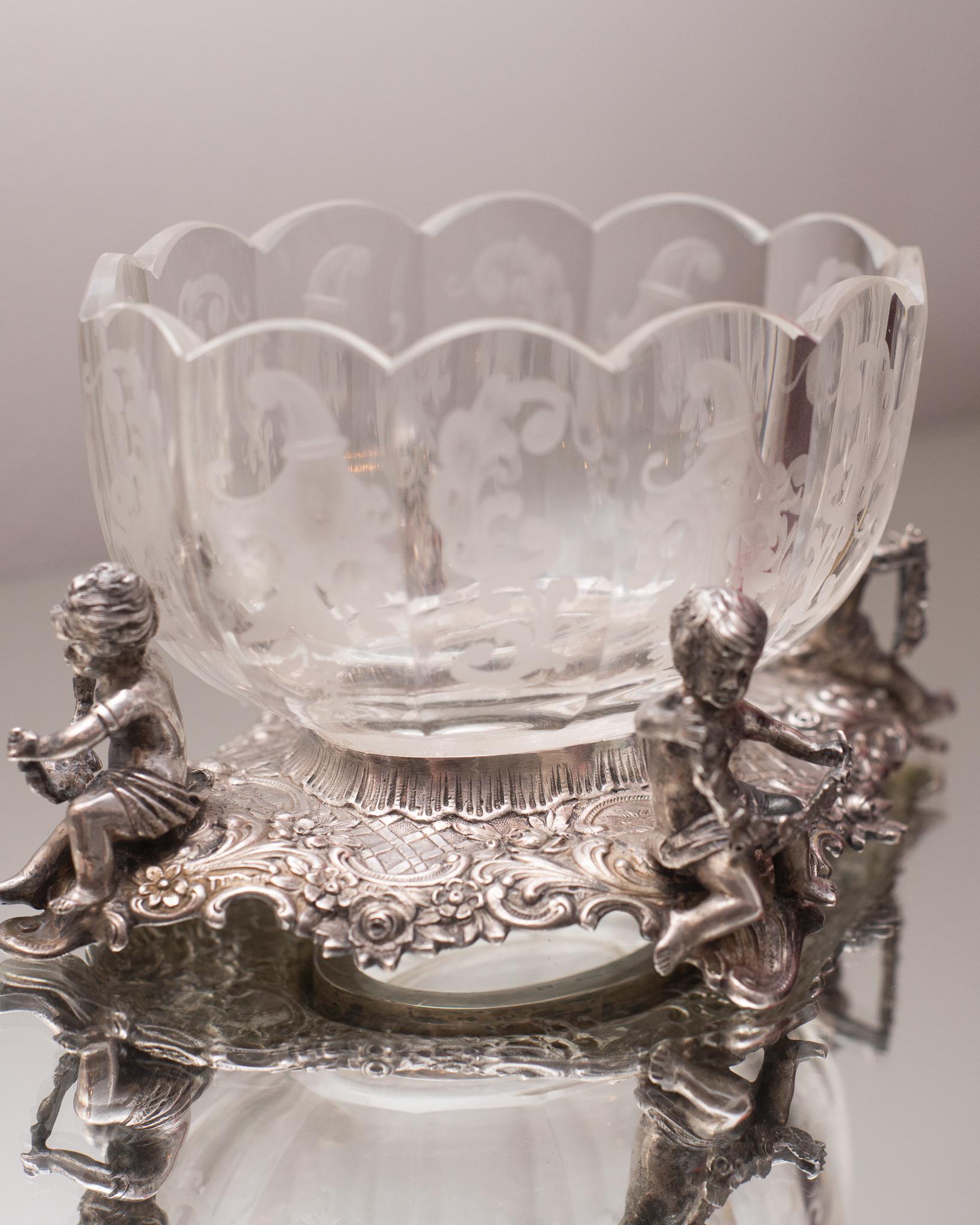 This ethereal antique German etched glass bowl on a 800 German silver base decorated with cherubs is a precious addition to any table. This jewel belongs in a powder room, master bedroom or on any coffee table.