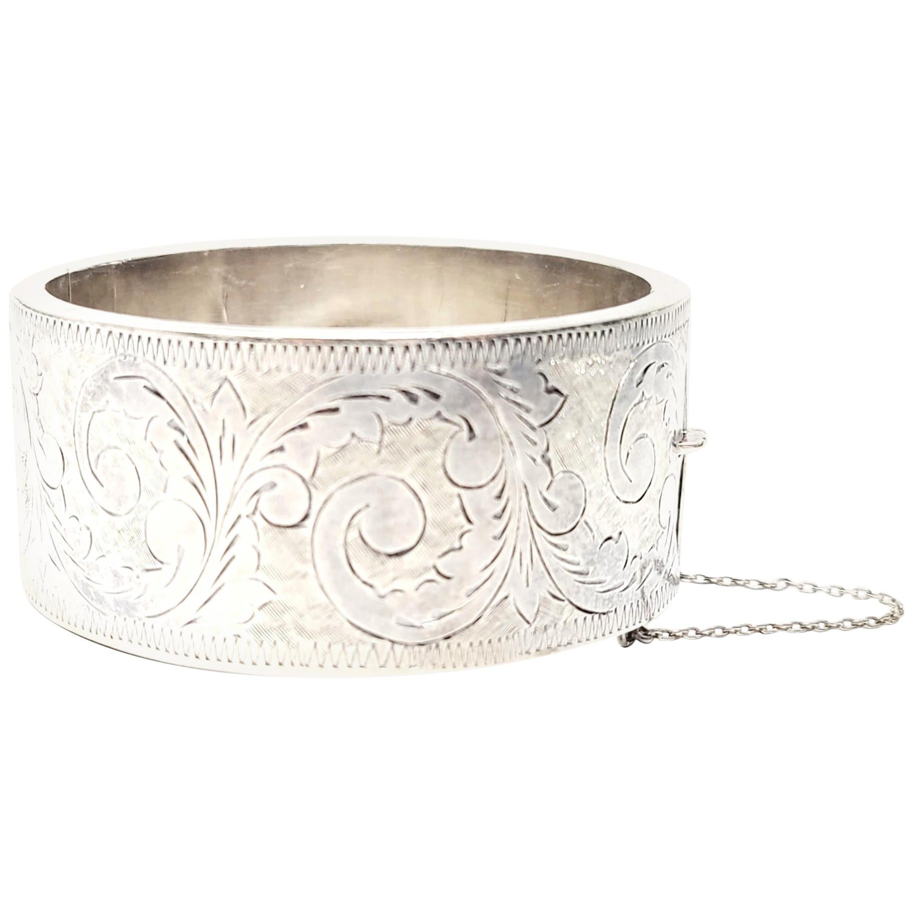 Sterling Silver engraved floral and scroll bangle bracelet, circa 1960 - .  The Georgian Artisan Shop