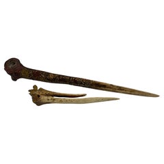 Ancien artefact ethnique de la rivière Sepik, os Cassowary de Papouasie-Nouvelle-Guinée