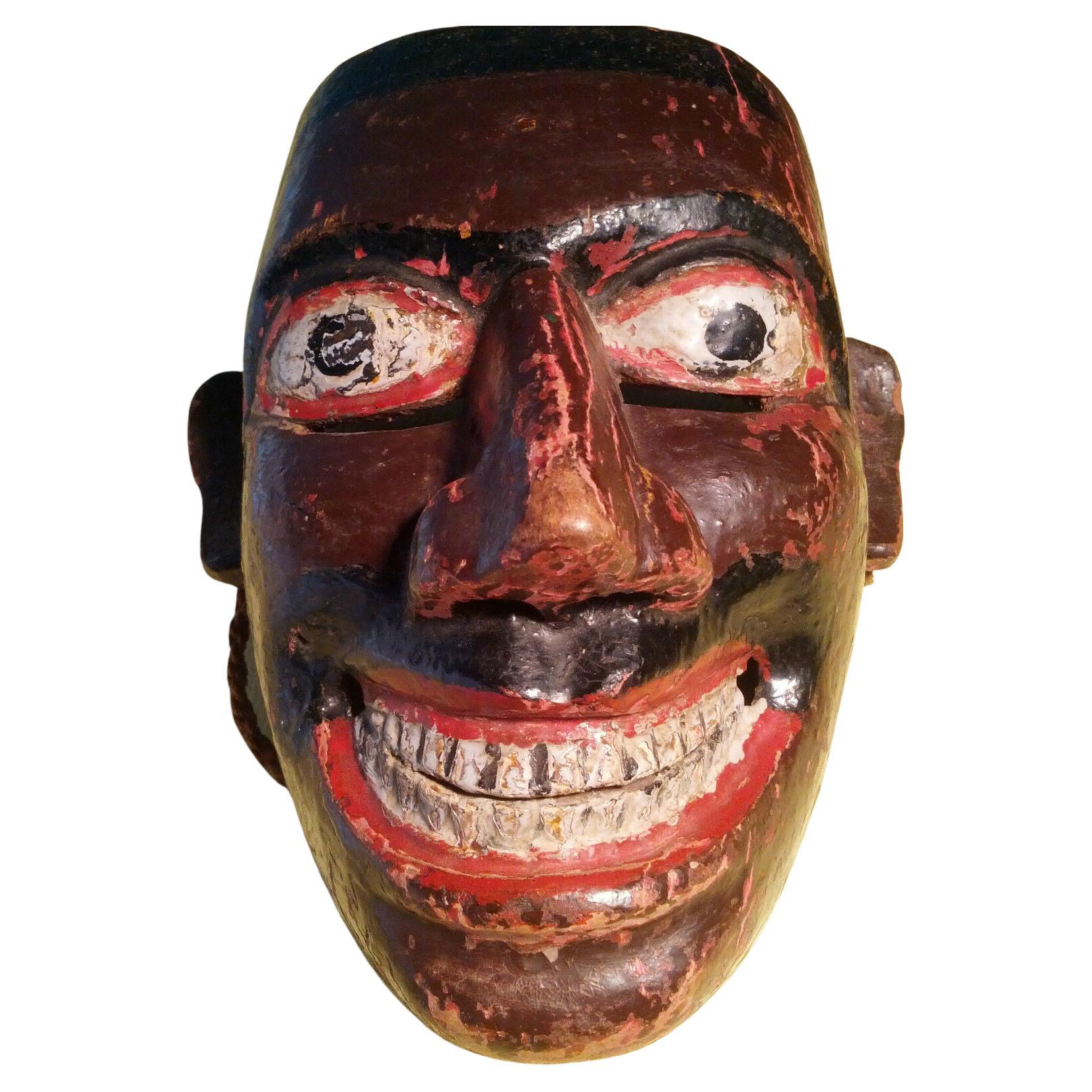 Masque de danse ethnographique ancien en bois polychrome du Sri Lanka Pita Sanniya en vente