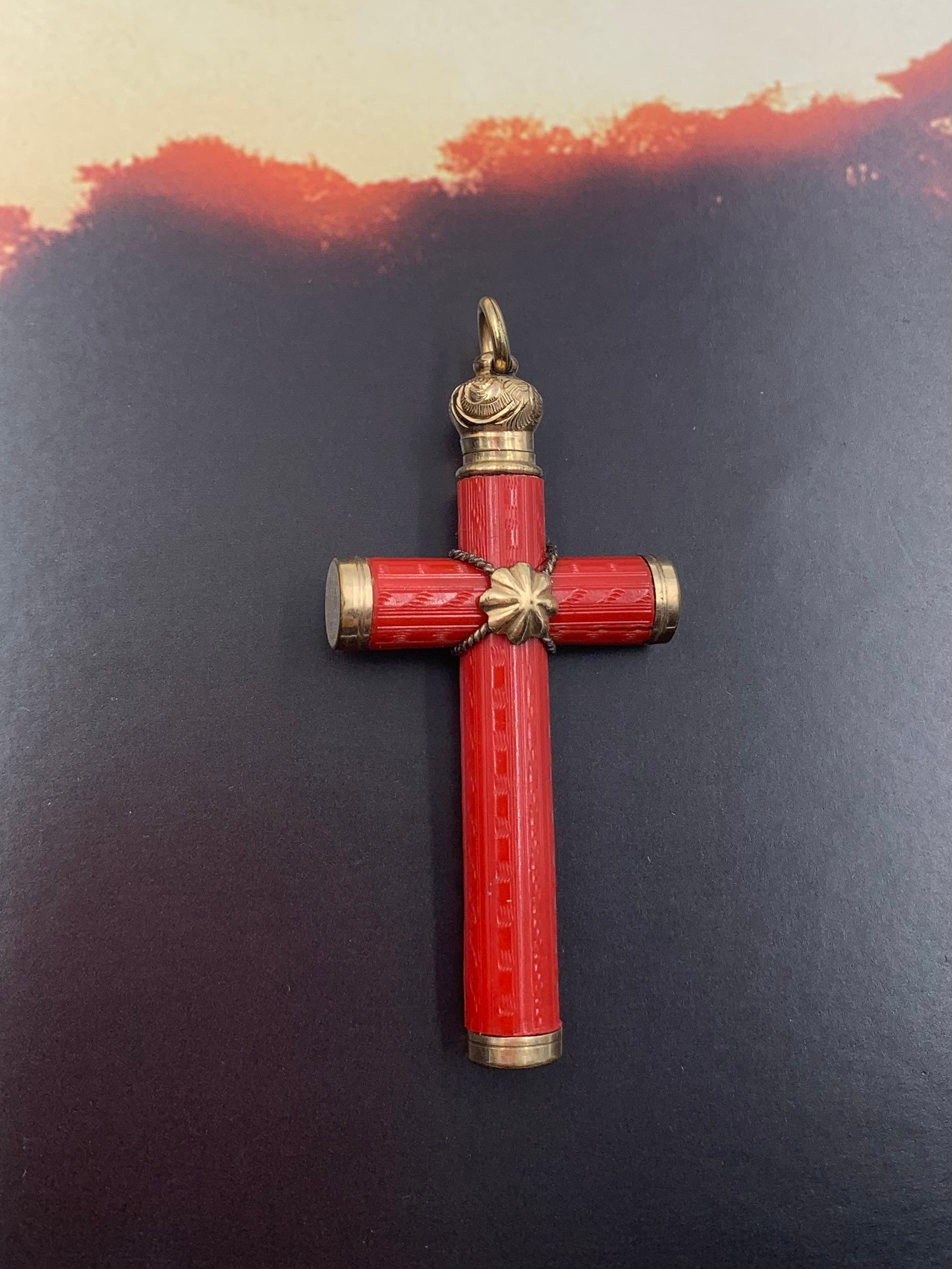Very fine antique Etruscan Revival 18K yellow gold engraved precious red coral cross 
19th century
Exquisitely engraved rich red coral cross pendant mounted in beautifully detailed 18K yellow gold setting with twisted wire work details and a