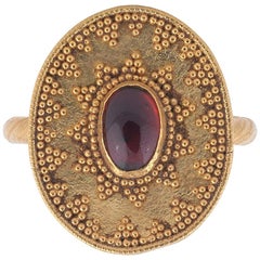 Bague en grenat de style néo-étrusque antique