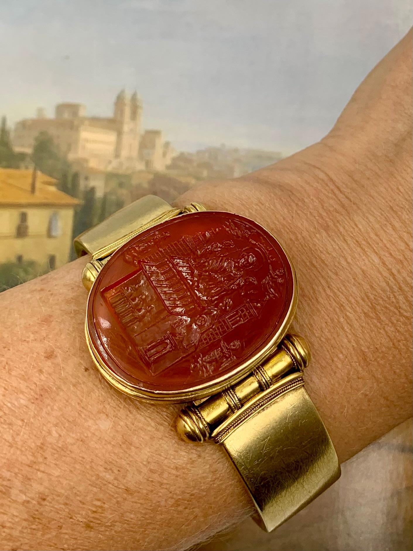 Museum quality antique Etruscan Revival carnelian intaglio 15K yellow gold large locket bracelet 
Circa 1860
The large scale of this stunning bracelet indicates that it was created for a very wealthy individual, likely to commemorate a Grand Tour