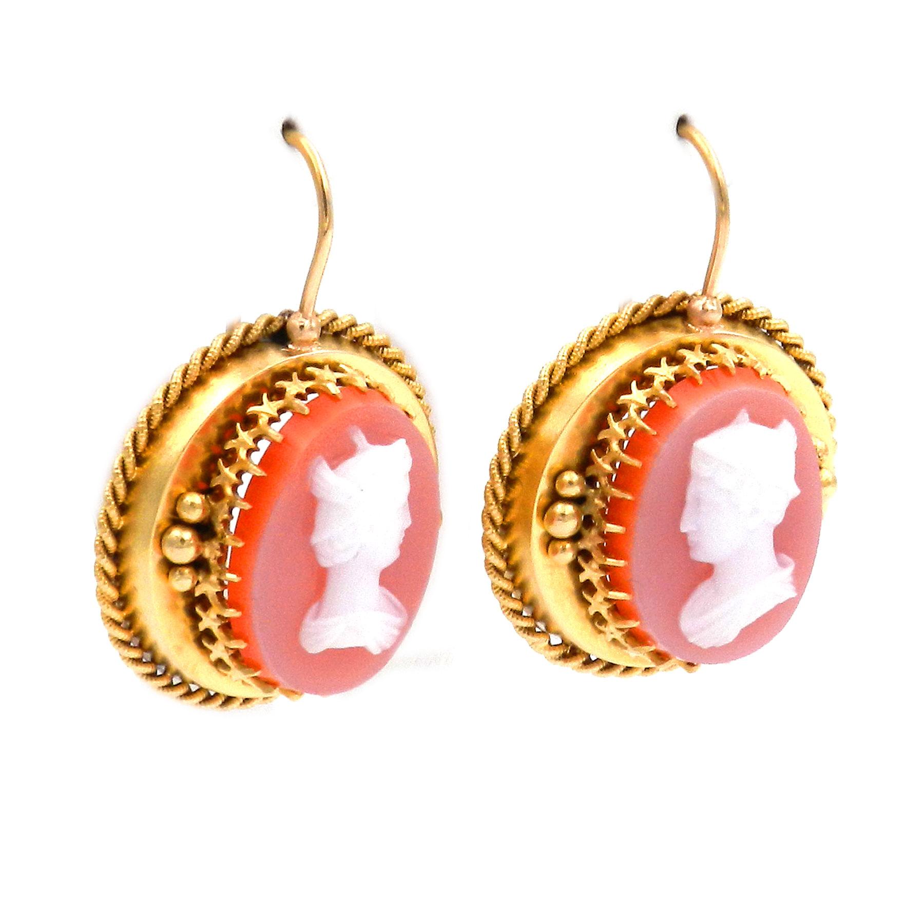 Antique Etruscan Style Agate Cameo Gold Earrings circa 1860

These decorative earrings with agate gems in the archaeological style were made around 1860 from 14K gold. A large oval agate cameo depicting the finely cut profile of Mercury is mounted