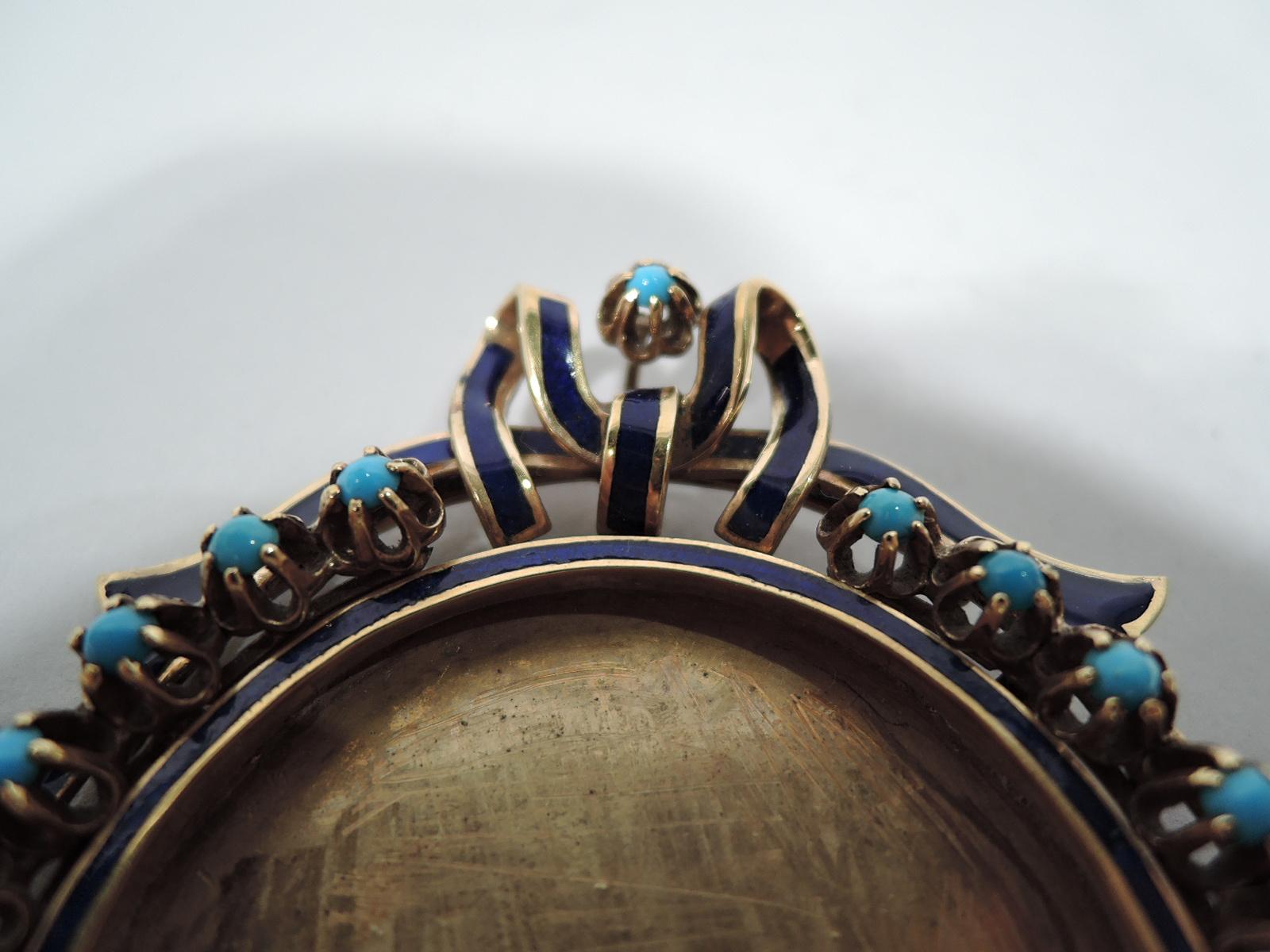 Turn-of-the-century European 18K gold picture frame. Round window bordered by blue enamel and cabochon turquoise beads. At top blue-enamel ribbon crown and at bottom stylized lozenge. Hinged ring support with scrolling leaf mount. Marked.