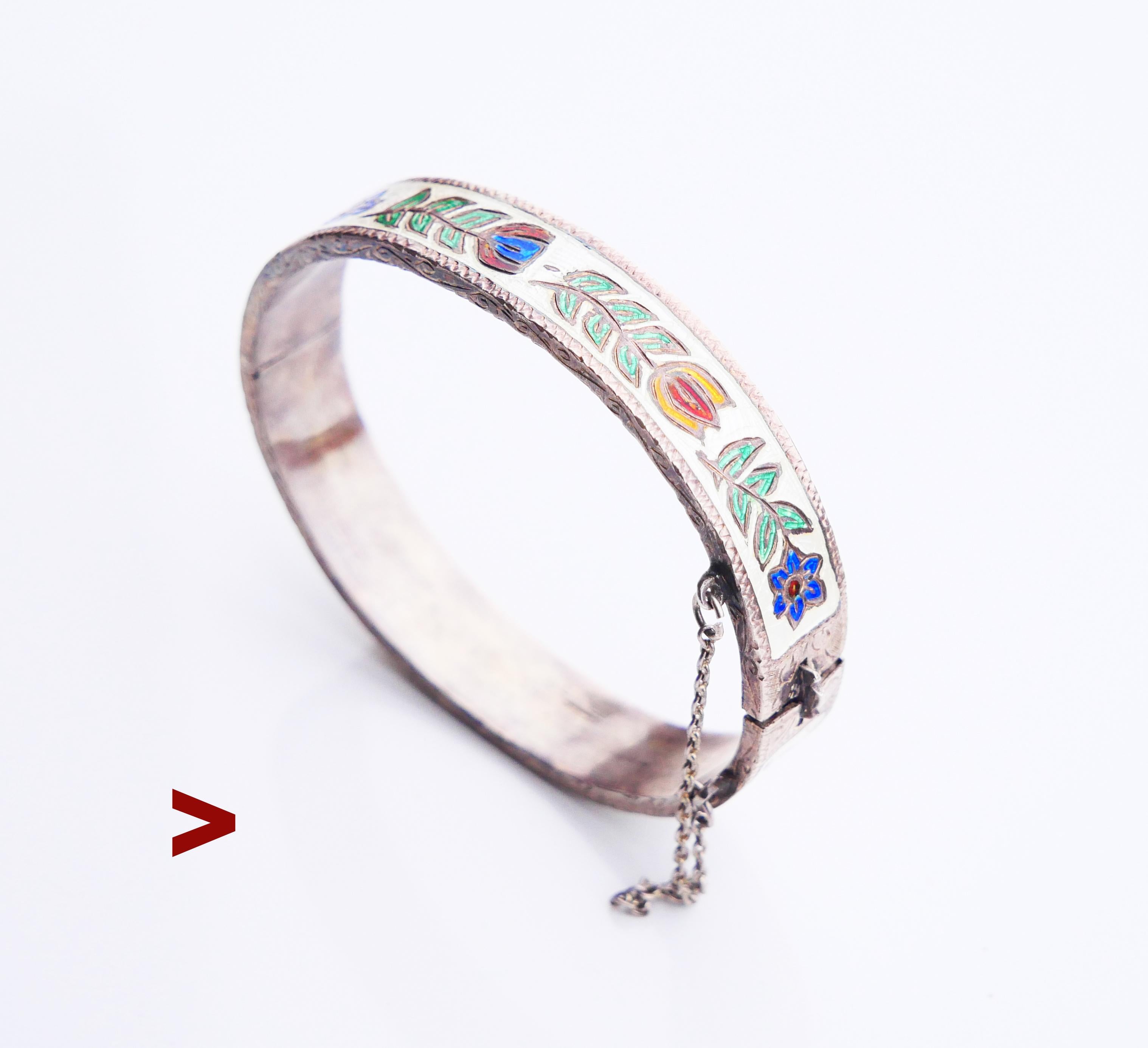 Antique  Silver & champlevé Enamel Bracelet with continuous hand - engraved and enameled floral ornament. Combination of White, Blue, Red ,Green and Yellow. Original V - lock and security chain.

Swedish early XX cent. import customs marks