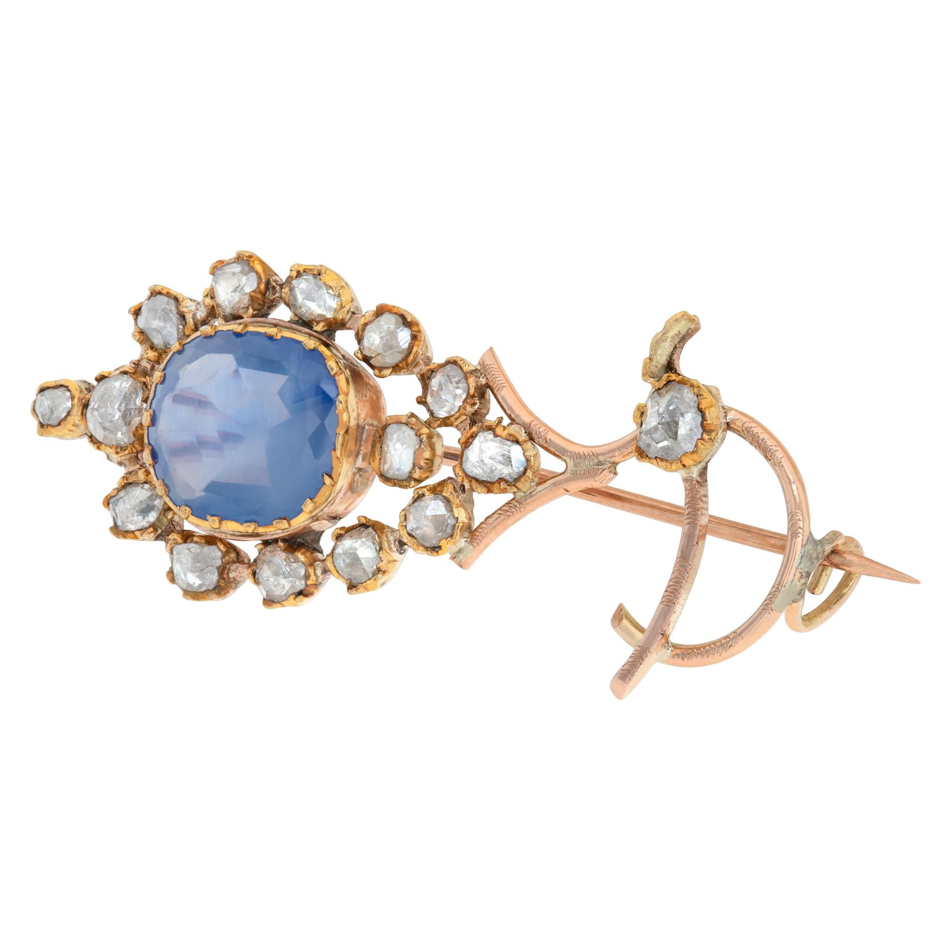 AGL Ceritified Antique European brooch, circa 1800's. with old mine cut diamonds and cushion, mixed cut natural unheated Ceylon corundum sapphire center, estimated over 10 carats, set in 18k rose gold.