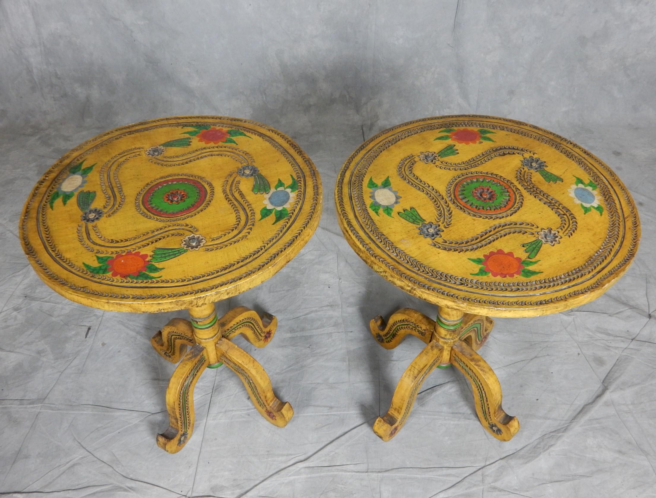 Charming antique Scandinavian folk art tables. 
These have an old world feel to them.
Hand carved with painted floral design.
Not signed or marked. Approx circa 1930's or earlier.
24in tall X 21in wide.