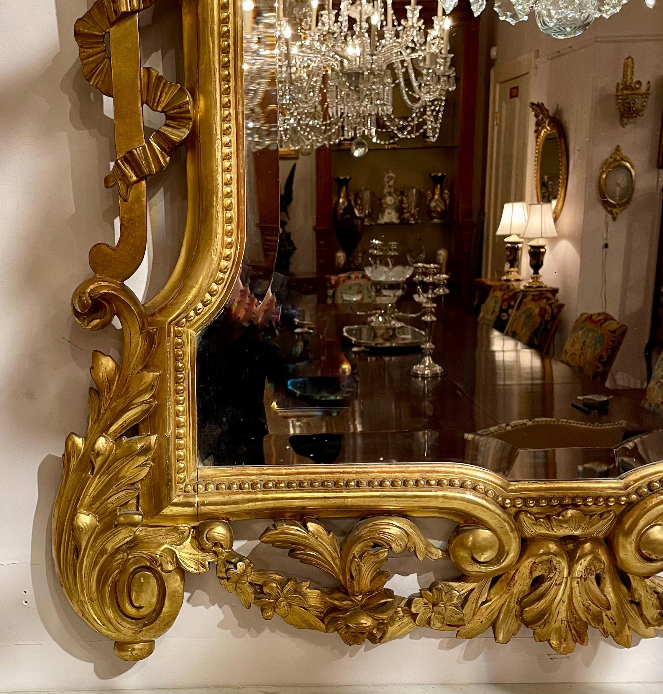 Européen Antique European Carved Wood with Gold Leaf Beveled Mirror, Circa 1880. en vente
