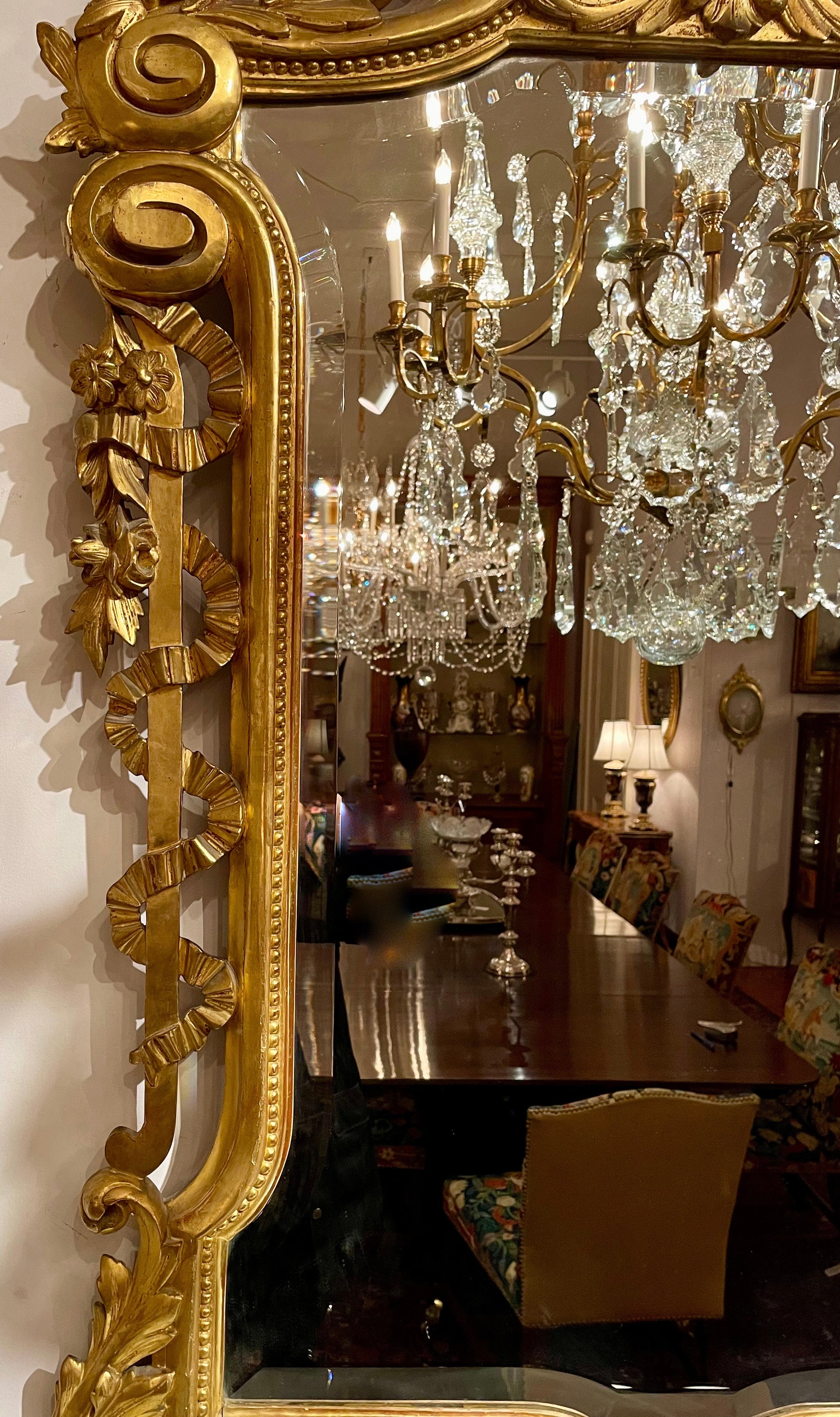 Biseauté Antique European Carved Wood with Gold Leaf Beveled Mirror, Circa 1880. en vente