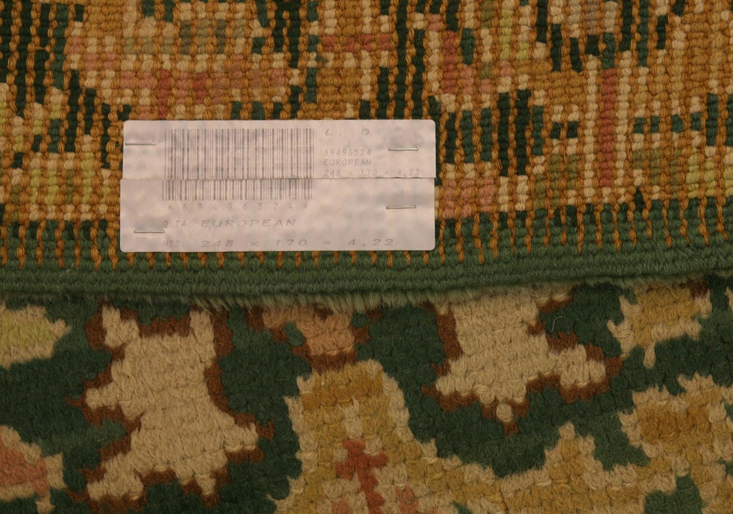 Antique European Donegal All-Over Green Field Wool Rug, ca. 1920 In Good Condition In Ferrara, IT