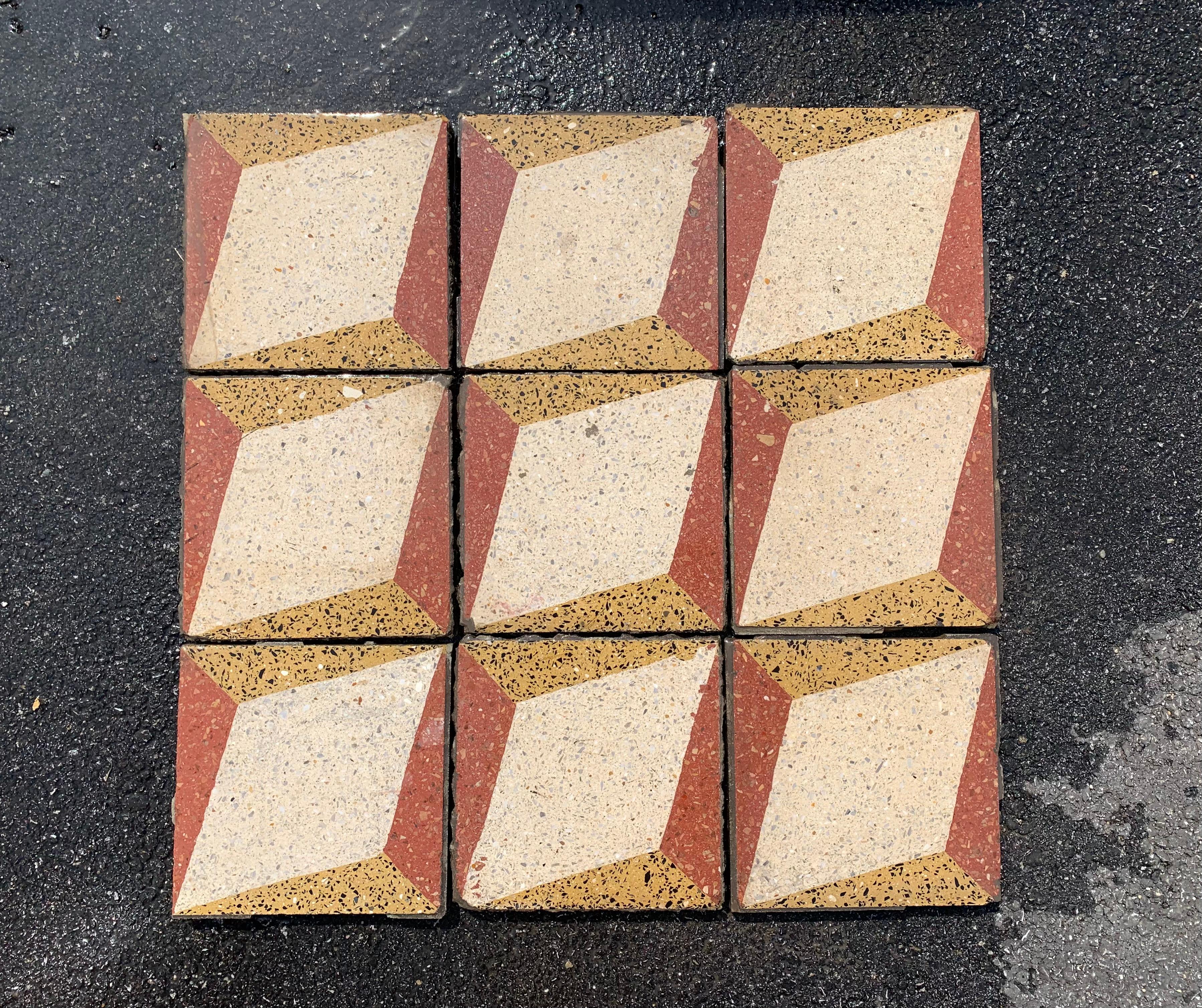 Encaustic cement tiles were pioneered by the French in the middle of the 19th century and relied on chemical curing rather than traditional firing.  This technique had the advantage of creating a consistently flat and uniform tile.  
Just as with
