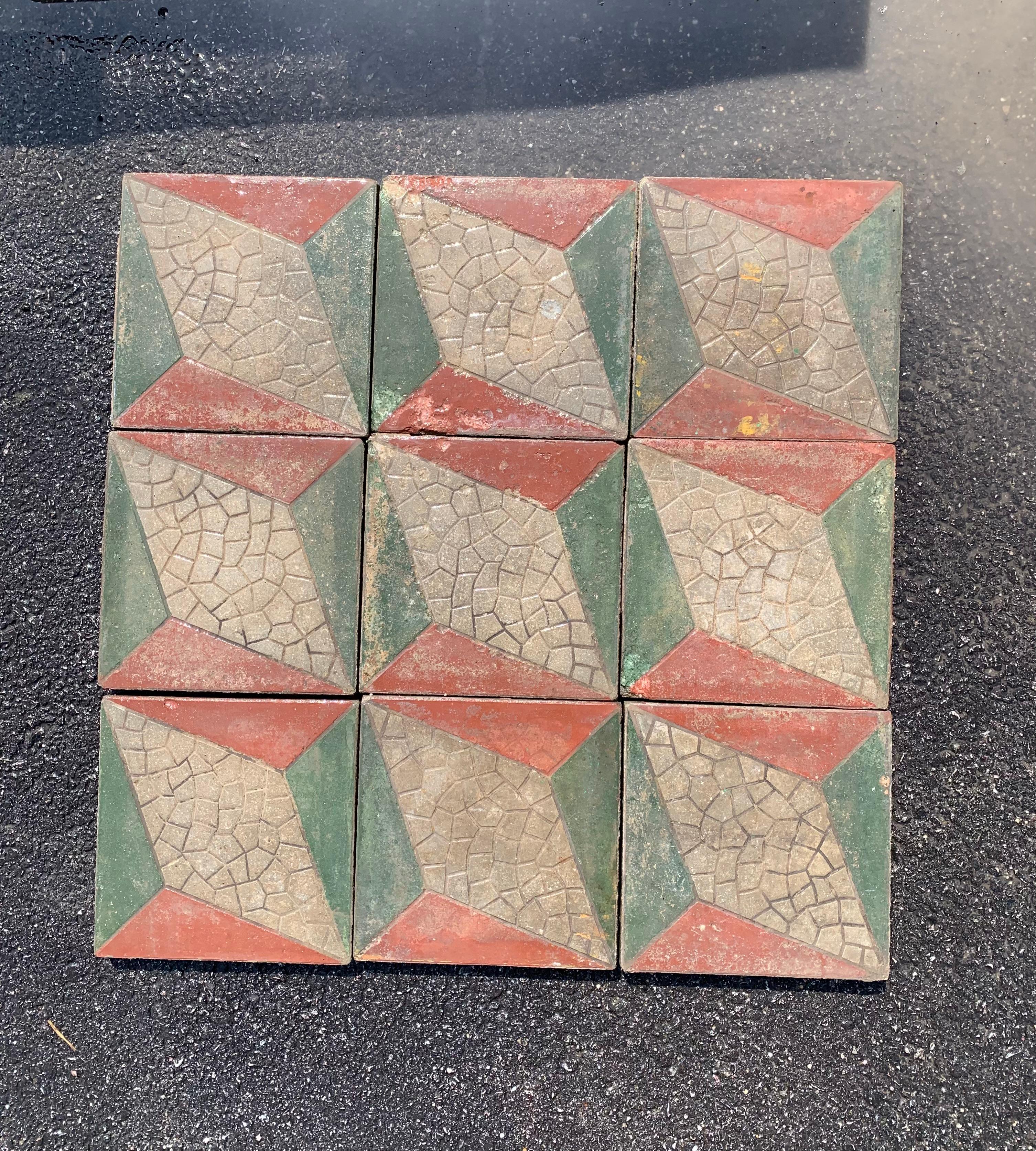 Encaustic cement tiles were pioneered by the French in the middle of the 19th century and relied on chemical curing rather than traditional firing.  This technique had the advantage of creating a consistently flat and uniform tile.  
Just as with