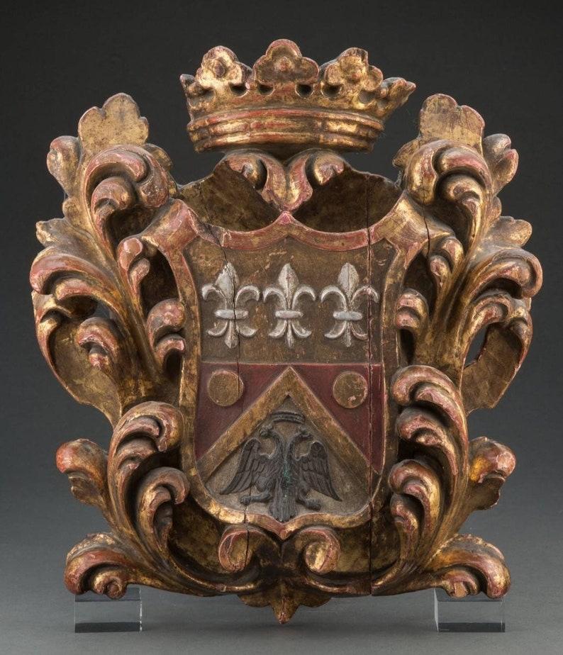 A scarce, likely one-of-a-kind, most impressive antique European hand carved, painted, and gilded wooden armorial achievement panel, likely French origin, 18th century.

Exceptionally executed, featuring full display / depiction of all the heraldic