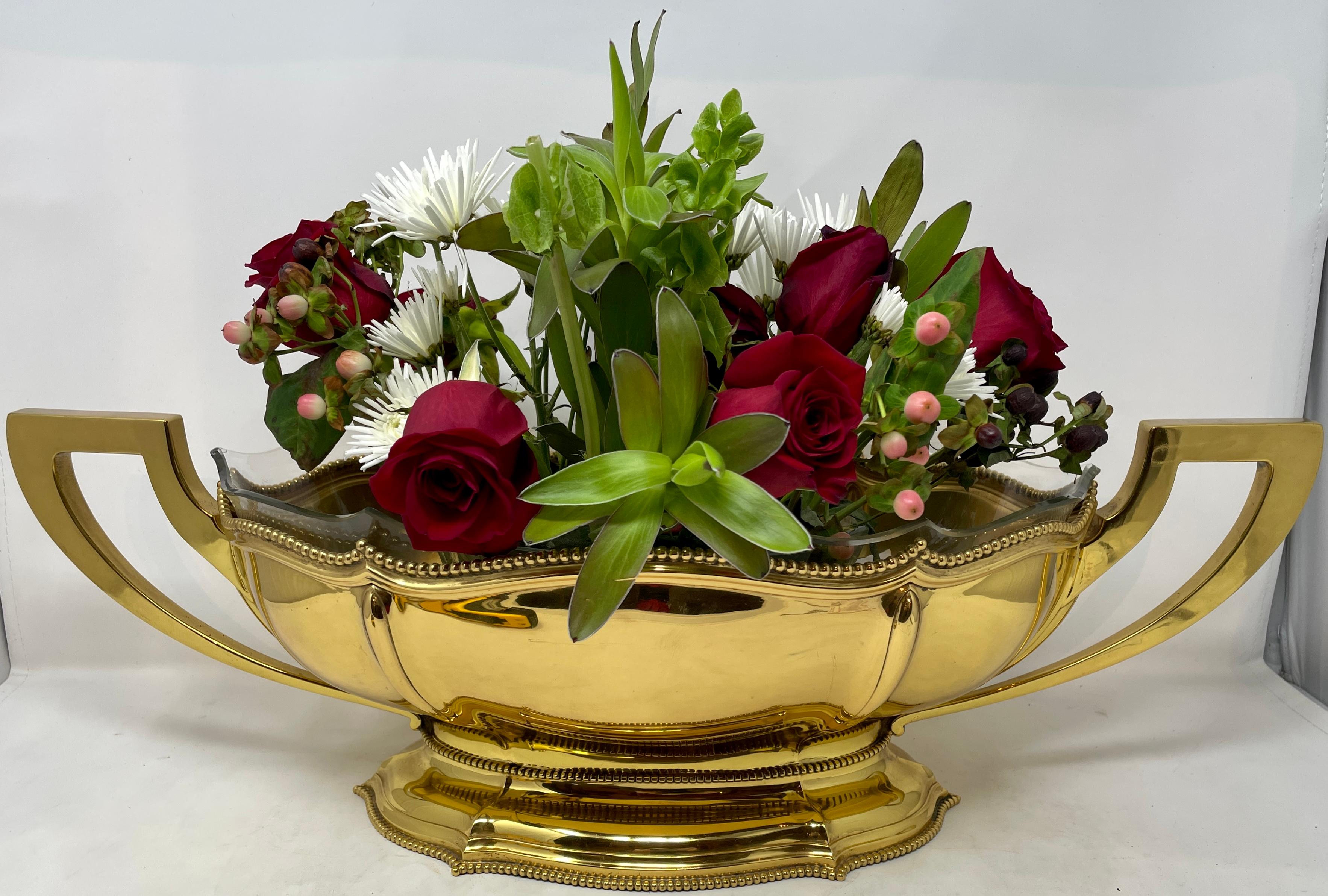 Antique European Gilt silver centerpiece, Circa 1890.
Footed Centerpiece Bowl with Handles, Glass Insert and Delicate Bead Detail.