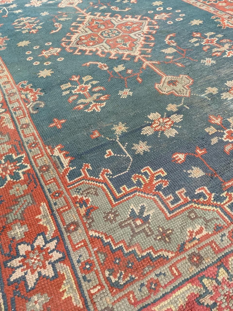 Beautiful late 19th century European rug with nice Turkish Oushak design a beautiful color with blue field and orange and green colors. Entirely hand knotted with wool velvet on cotton foundation.