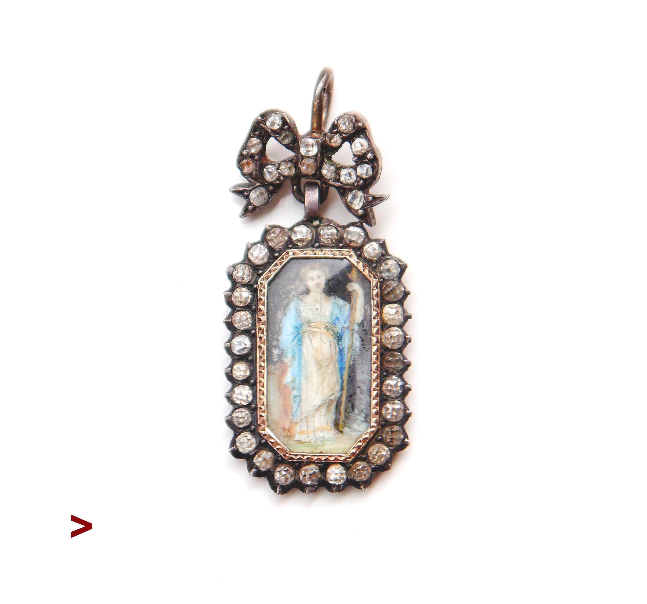 Antique Pendant with a miniature painting 16mm x 8 mm of the ancient Greek Goddess of harvest and fertility Demeter. The painting is concealed within a miniature frame made of gilt Silver with solid Gold bezel decorated with multiple old diamond-cut