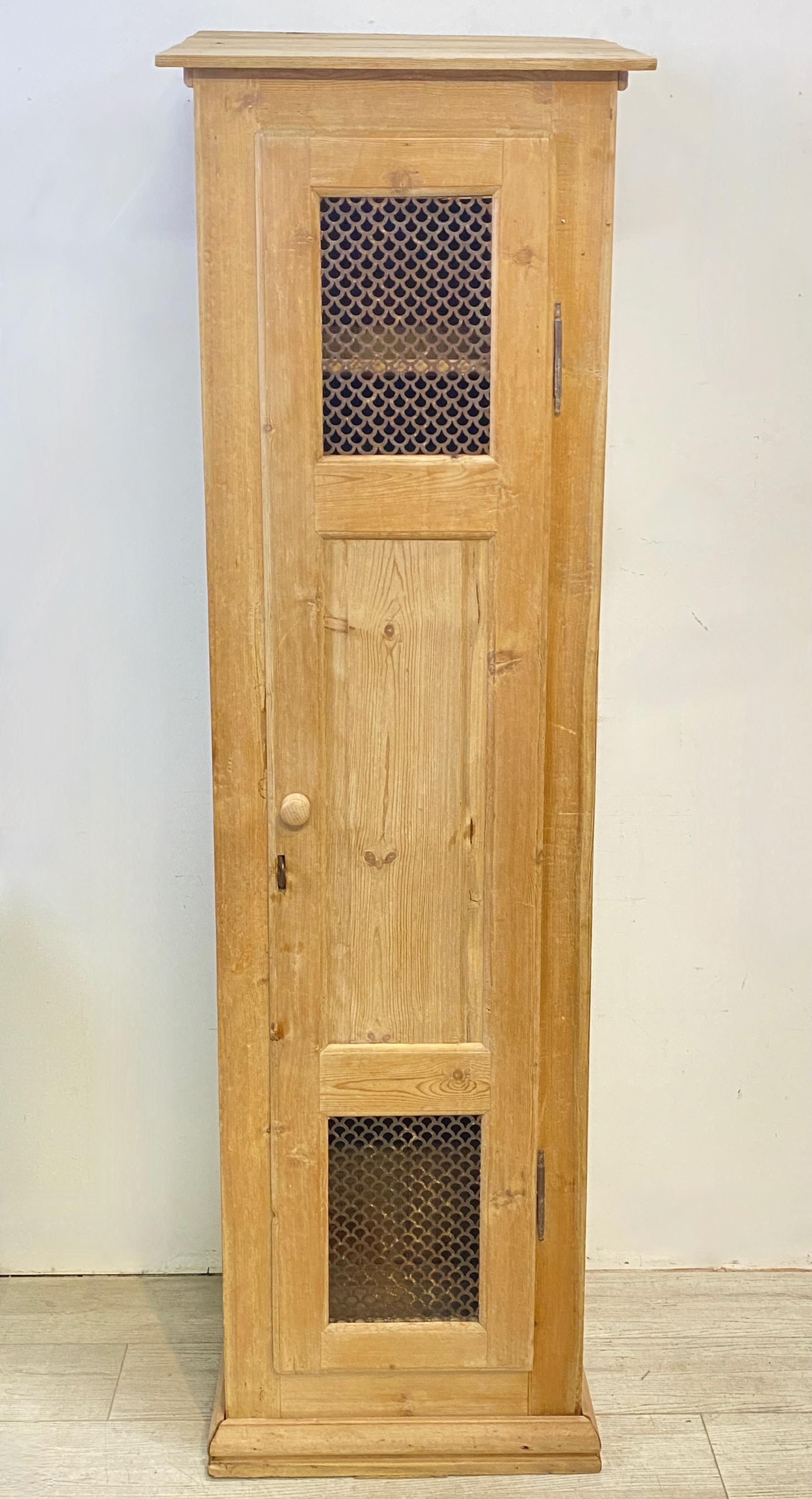 A tall slender antique pine locker or cabinet from a gym, spa or swimming club, circa 1900. 
Recently restored, and in excellent condition.