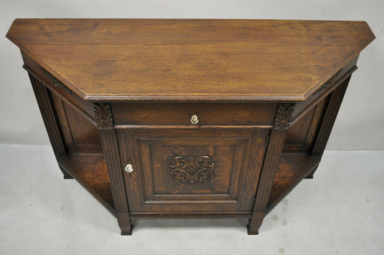 Antique European Renaissance Oak Wood Buffet Console Cabinet. Item features beautiful wood grain, nicely carved details,1 swing door, no key, but unlocked, 1 drawer, very nice vintage item. Circa Early 1900s. Measurements: 35