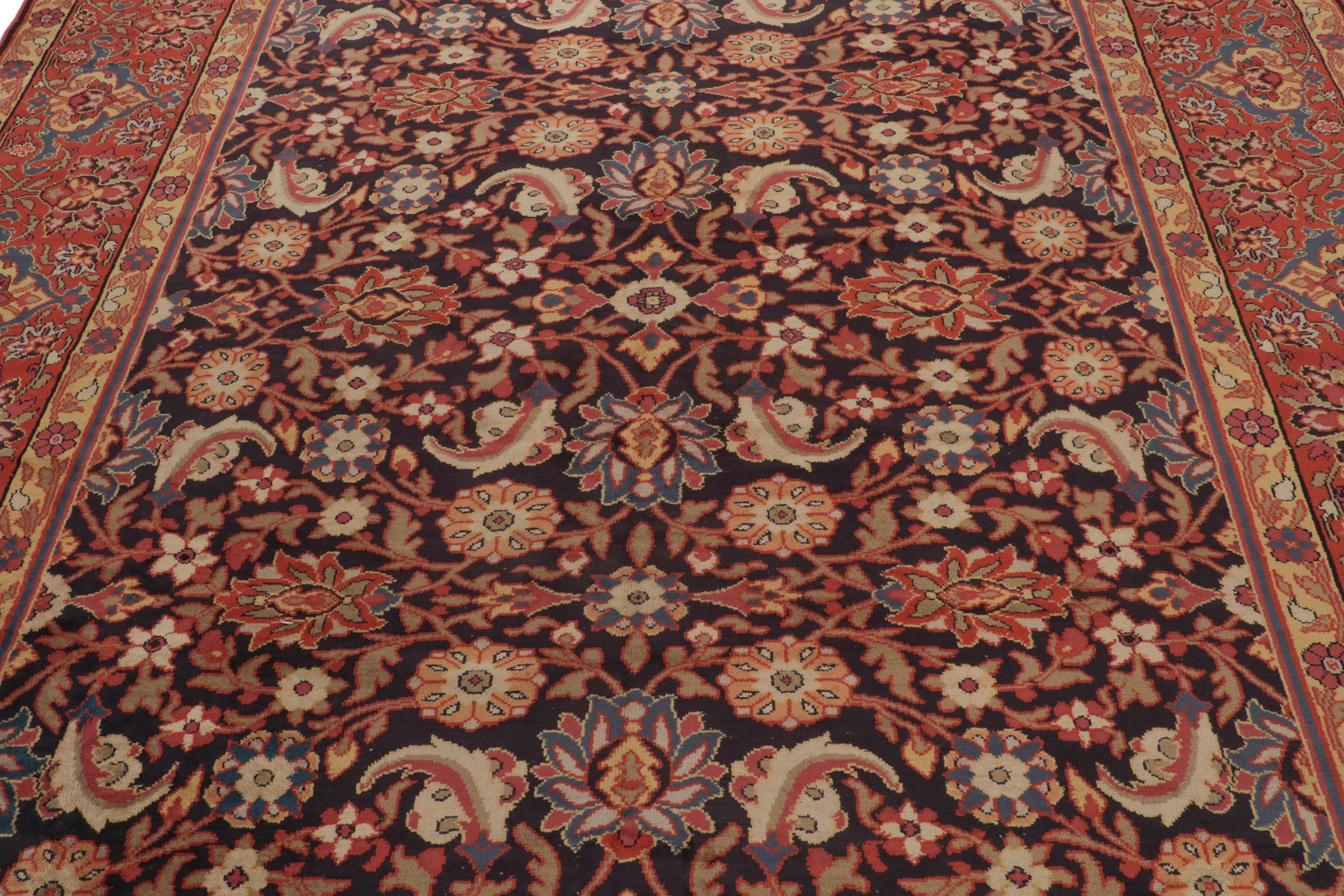 Hand-knotted in wool, an antique 8x11 European rug originating from Ireland circa 1920-1930 - inspired by Persian rugs of the same and preceding periods

On the Design:

The design enjoys a black field and red border alike underscoring floral
