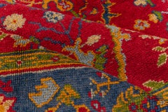 Antique European Rug with Bold Red and Blue Floral Motifs