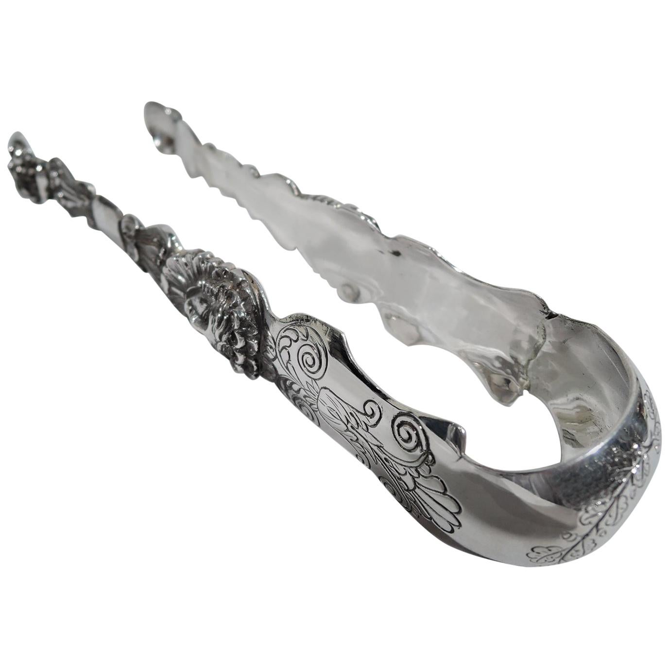 Antique European Silver Ice Tongs with Bold Classical Ornament