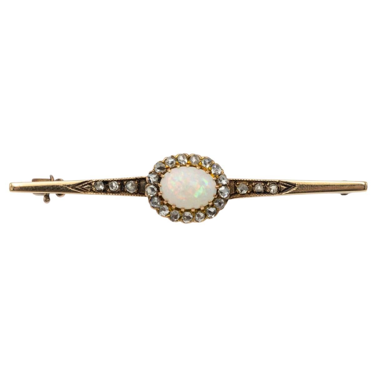 Antique Ewardian gold brooch with opal and diamonds, circa 1900.