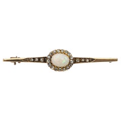 Antique Ewardian gold brooch with opal and diamonds, circa 1900.