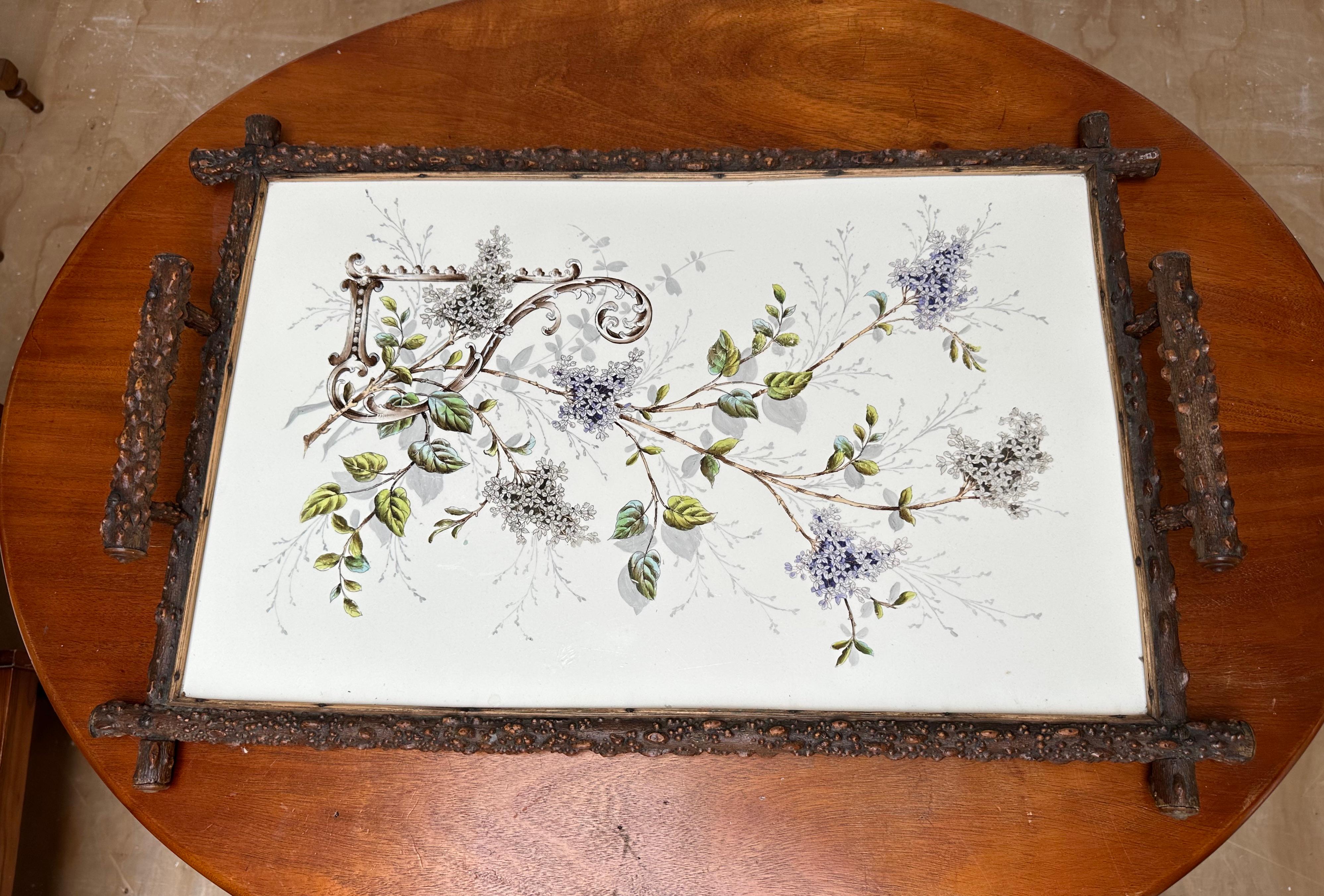 Rare and beautifully hand painted and glazed, porcelain tile in superb branches frame serving tray.

This beautiful quality and marvelous design tile serving tray is another one of our recent great finds and an absolute joy to own and to look at. It