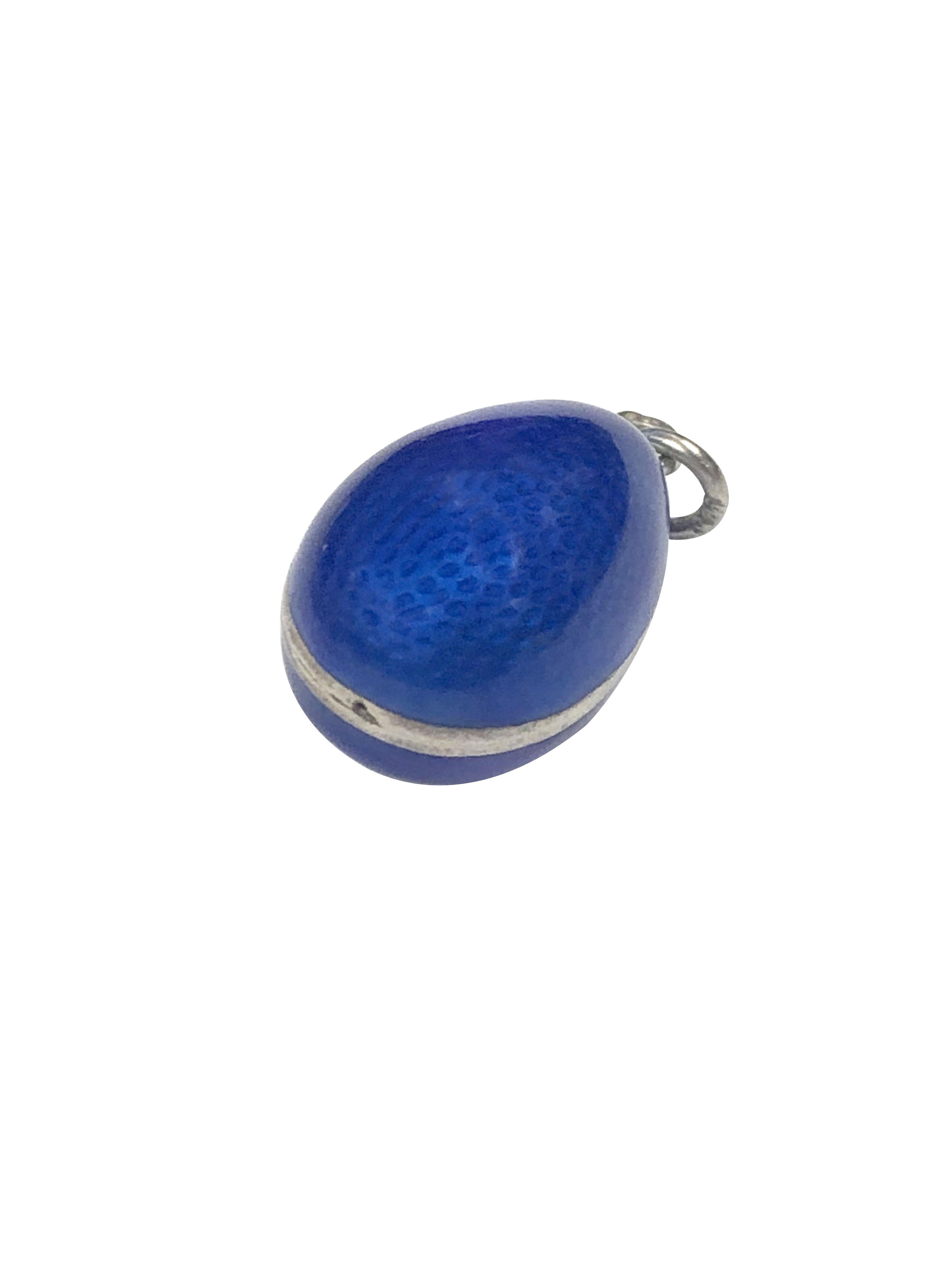 Circa 1900 - 1910 Carl Faberge 84 Silver Egg Pendant, measuring 3/4 inch in length with Cobalt Blue Guilloche Enamel and centrally set with a Rose Cut Diamond, having a stamp for Moscow and a Cyrillic stamp of Carl Faberge. Excellent condition, no