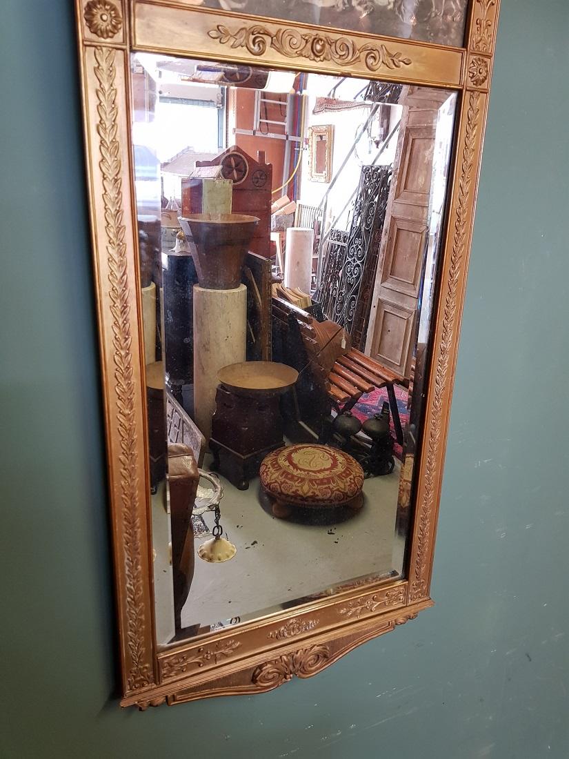 Gilt Antique Faceted Mirror in a Gilded Neoclassical Plaster Frame For Sale