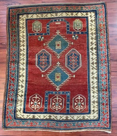 Antique Fachralo Kazak Rug
