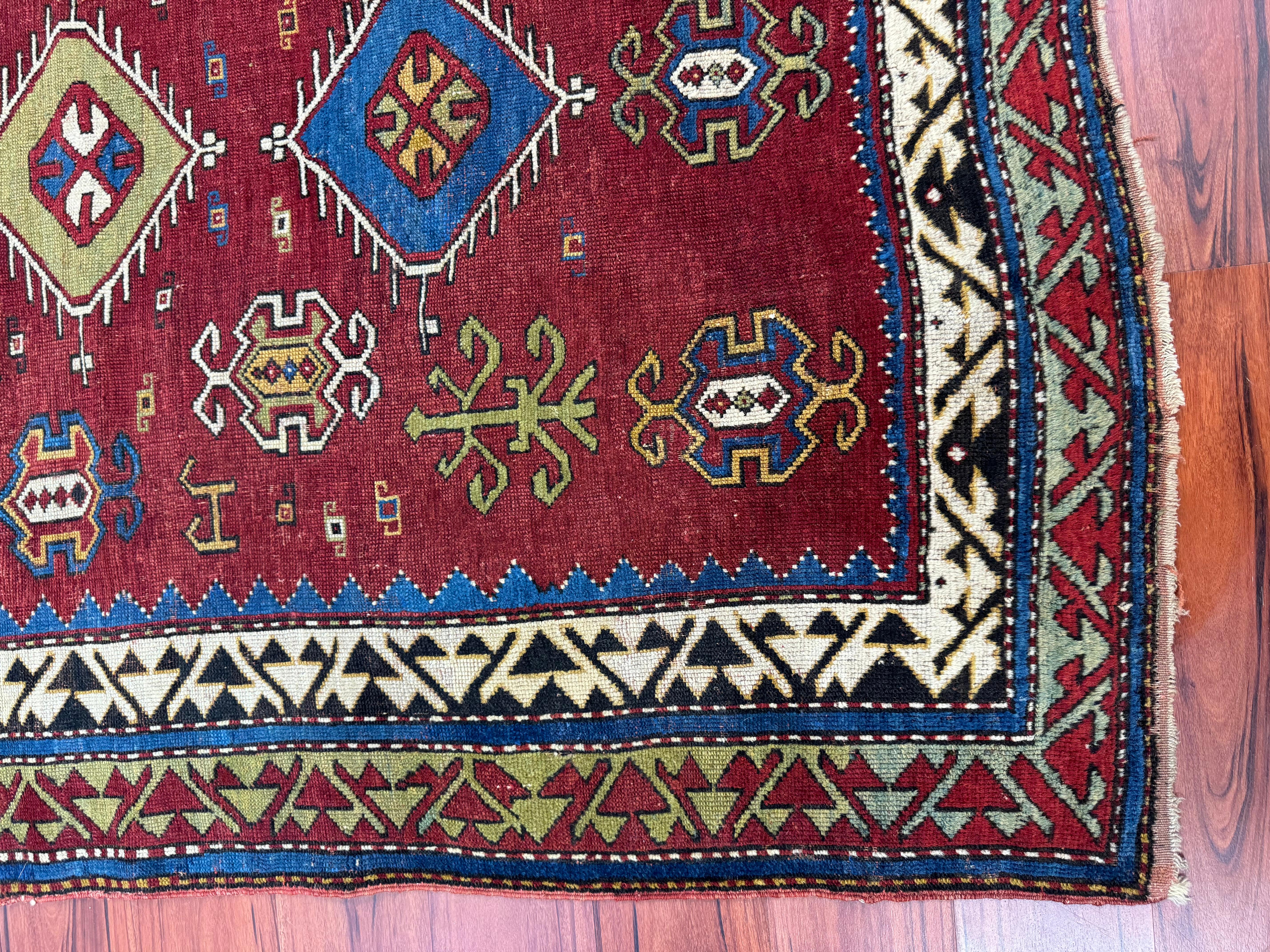 Hand-Woven Antique Fachralo Kazak Rug  For Sale