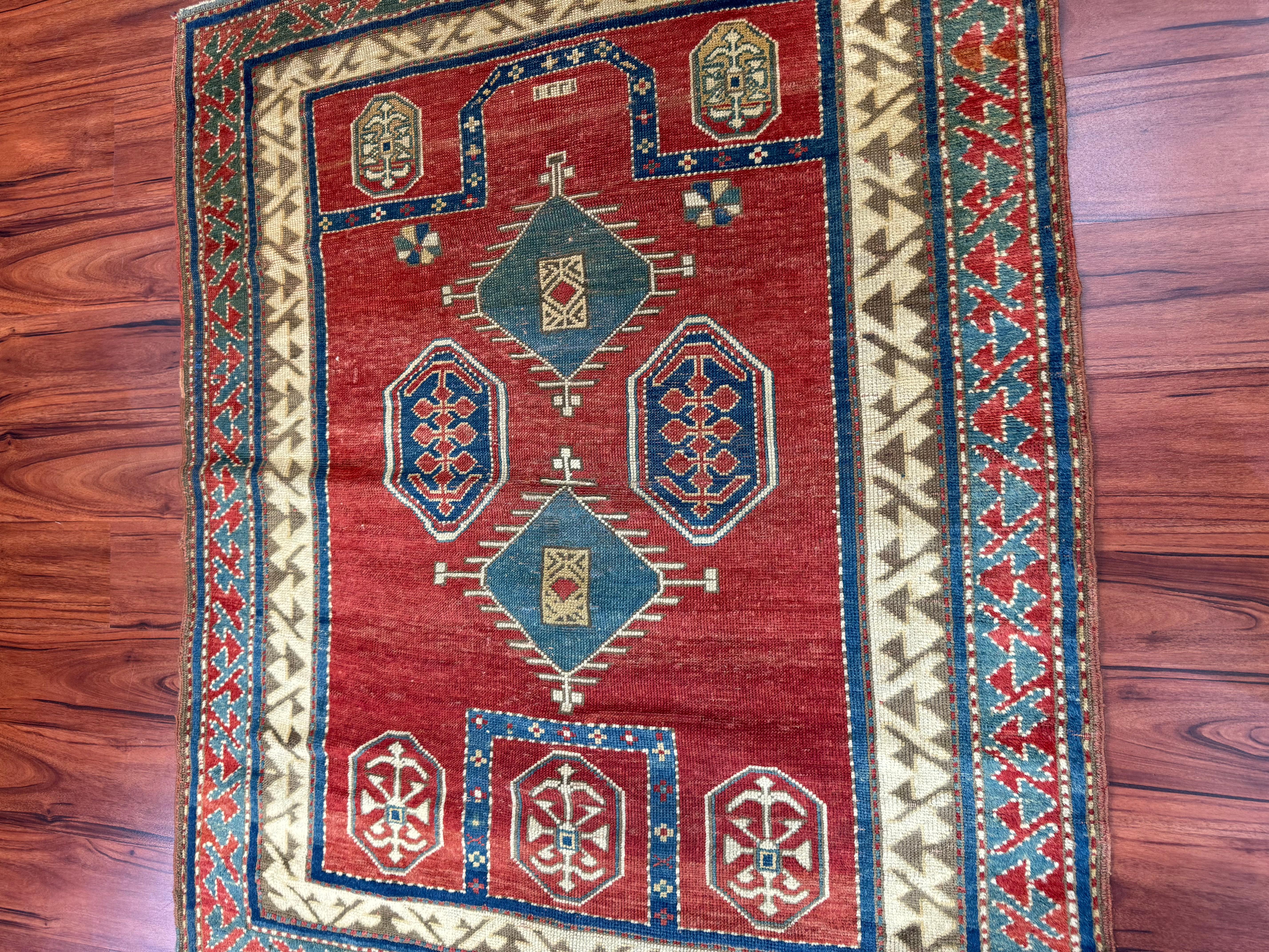 Wool Antique Fachralo Kazak Rug For Sale