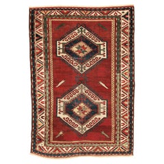Antico tappeto Kazak Fachralo con dispositivi esagonali e uccelli