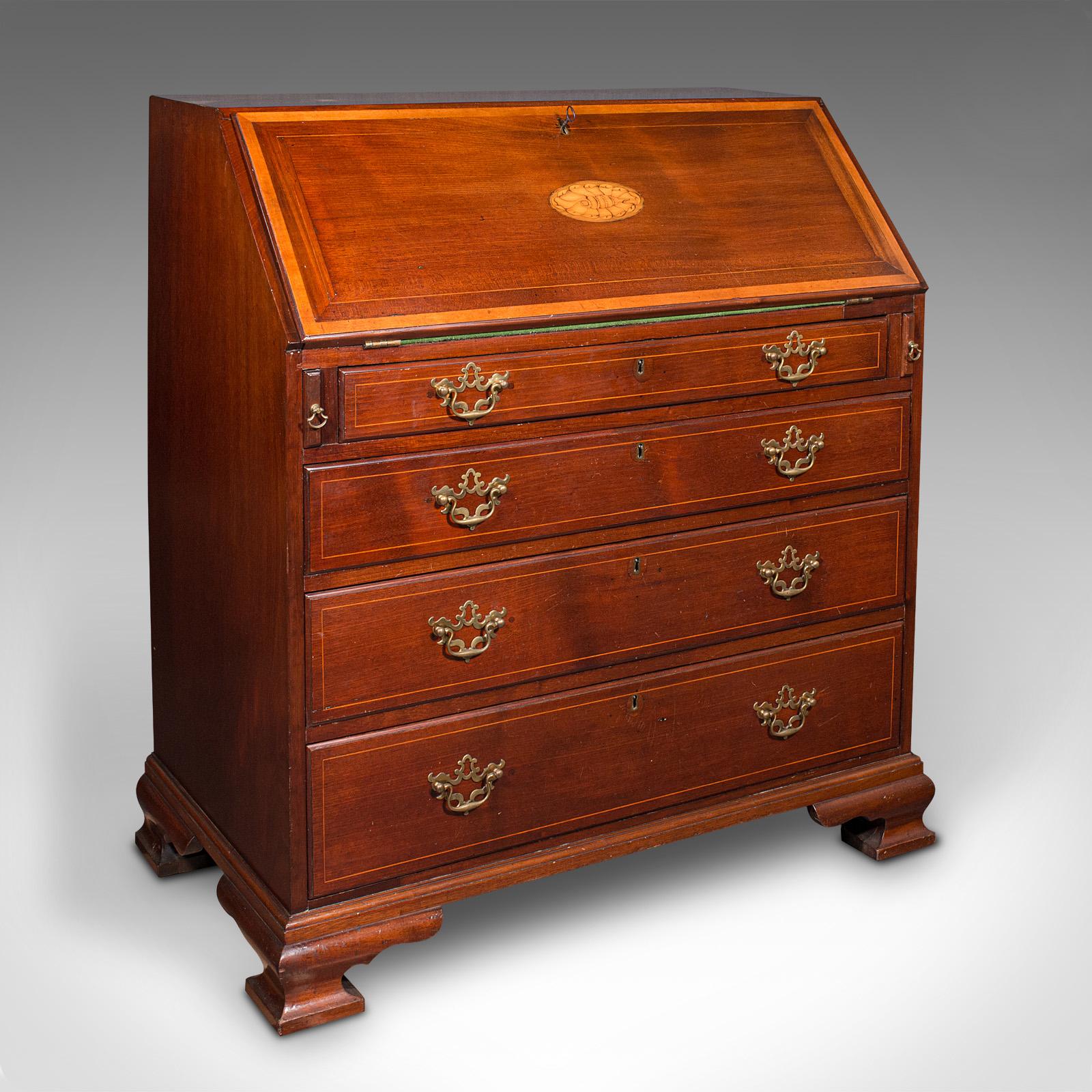 This is an antique fall front bureau. A Scottish, mahogany writing desk in Georgian revival taste by Japp of Montrose, dating to the late Victorian period, circa 1870.

Fine example of Scottish craftsmanship, with a superb finish and well