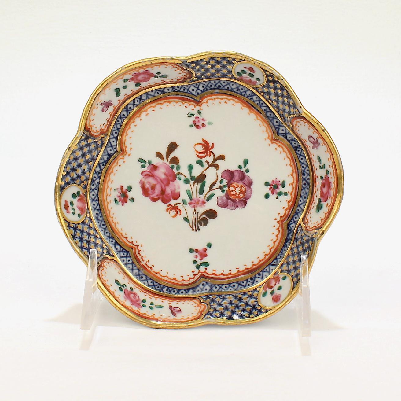 A very fine small Chinese export porcelain bowl.

With famille rose decoration, blue underglaze cells, and a scalloped edge.

It was likely made for either the American or European market.

Date:
Late 18th or early 19th century

Overall