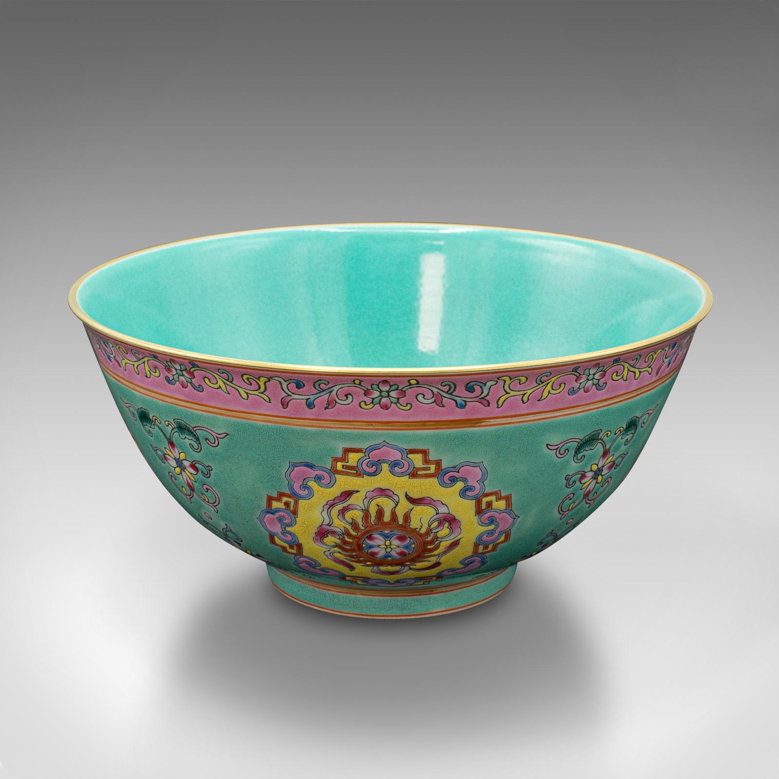 This is an antique Famille Rose decorative bowl. A Chinese, ceramic rice dish, dating to the late Victorian period, circa 1900.

Wondrous colour and detail, a bowl of fine distinction
Displays a desirable aged patina and in exceptional order
Ceramic